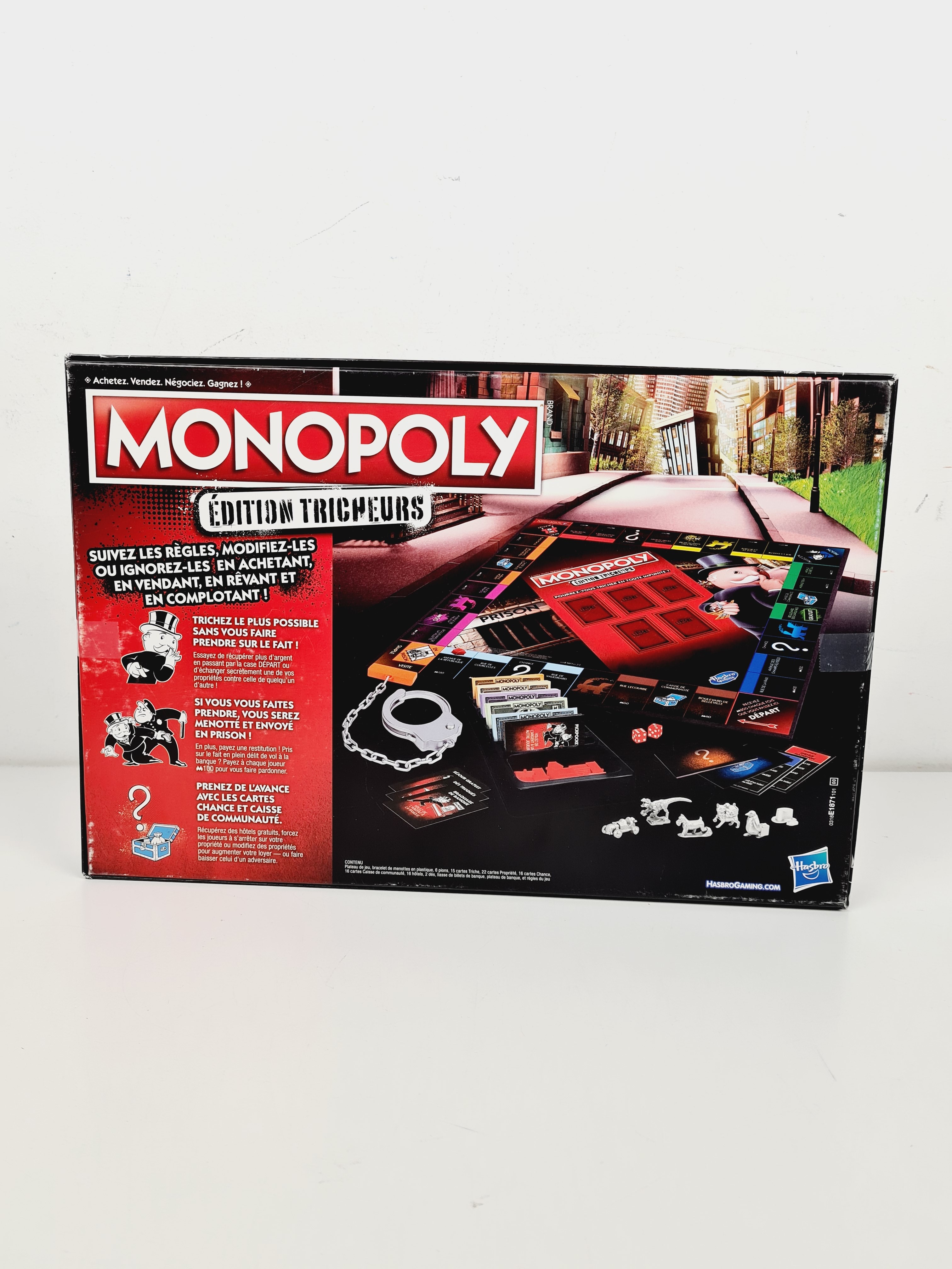 Voir photo 5 de Jeu de gestion de ressources - Monopoly - Éditions tricheurs - Hasbro - Dès 8 ans Jeu de gestion de ressources - Monopoly - Éditions tricheurs - Hasbro - Dès 8 ans Bon état reconditionné photo 5