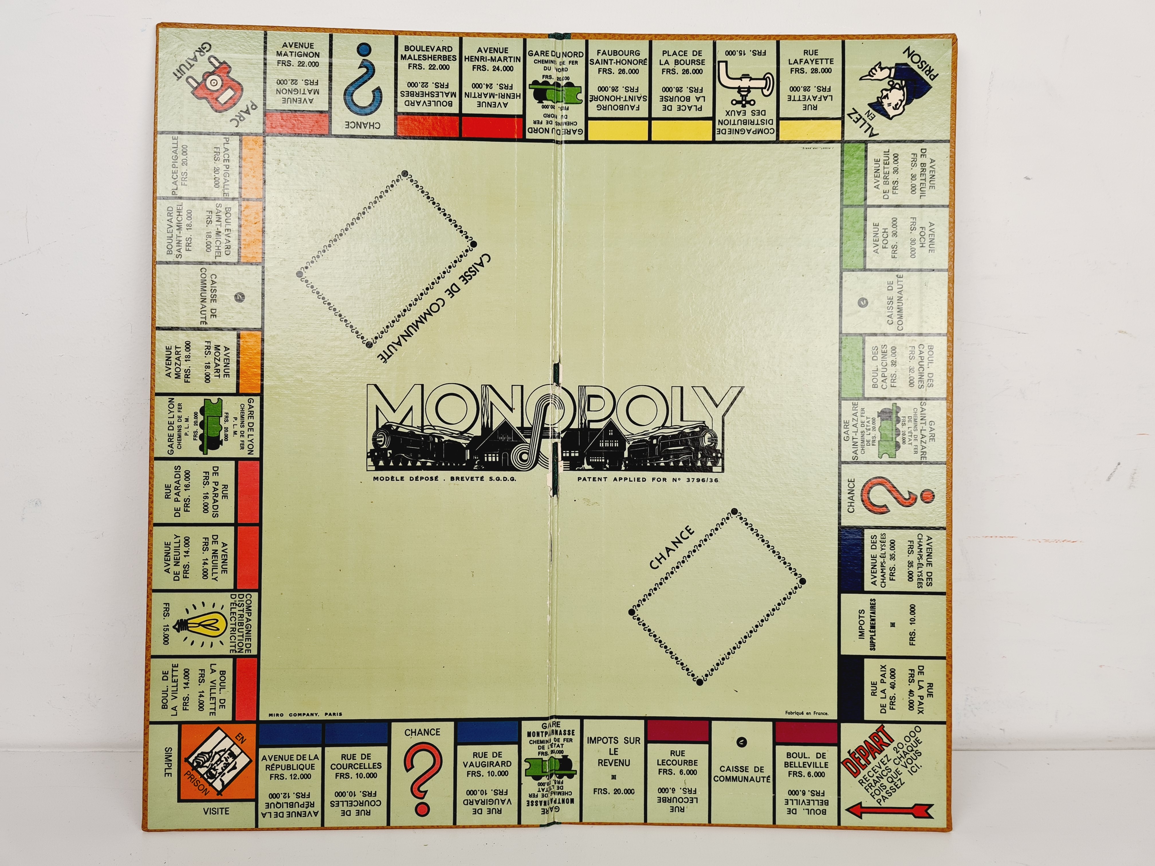 Voir photo 3 de Jeu de société ancien - Monopoly - Ed Miro Compagnie - Circa 1950 Jeu de société ancien - Monopoly - Ed Miro Compagnie - Circa 1950 reconditionné photo 3