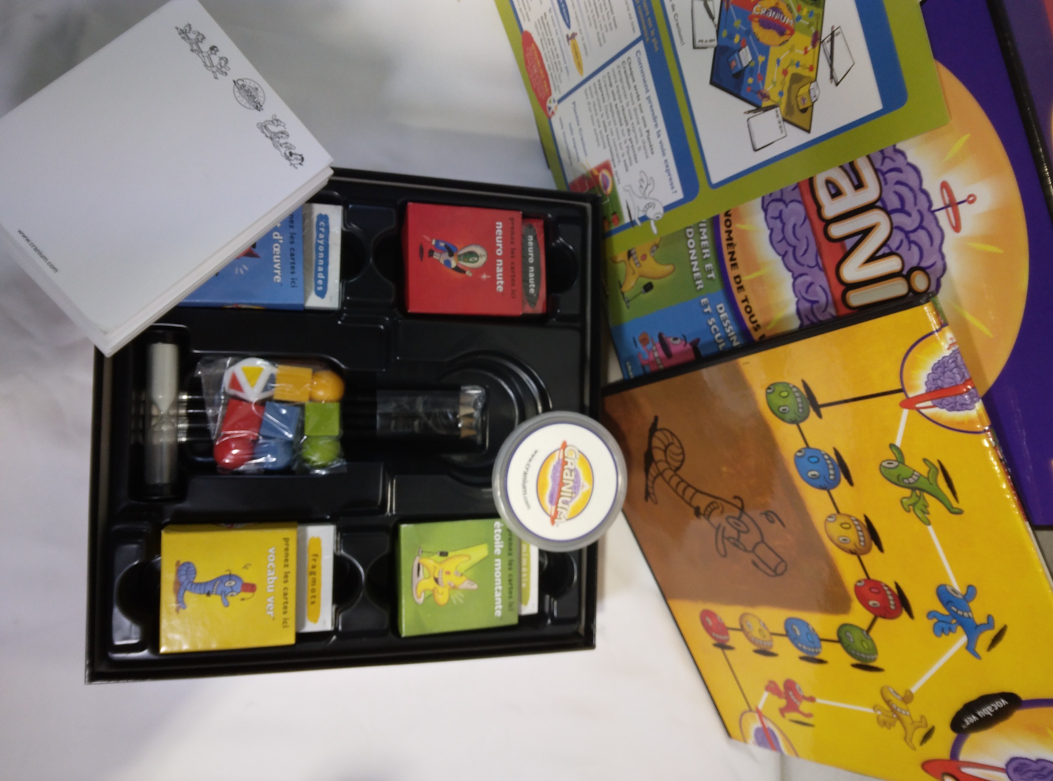 Voir photo 3 de Jeu de société Cranium 2001 neuf Jeu de société Cranium 2001 neuf Parfait état reconditionné photo 3