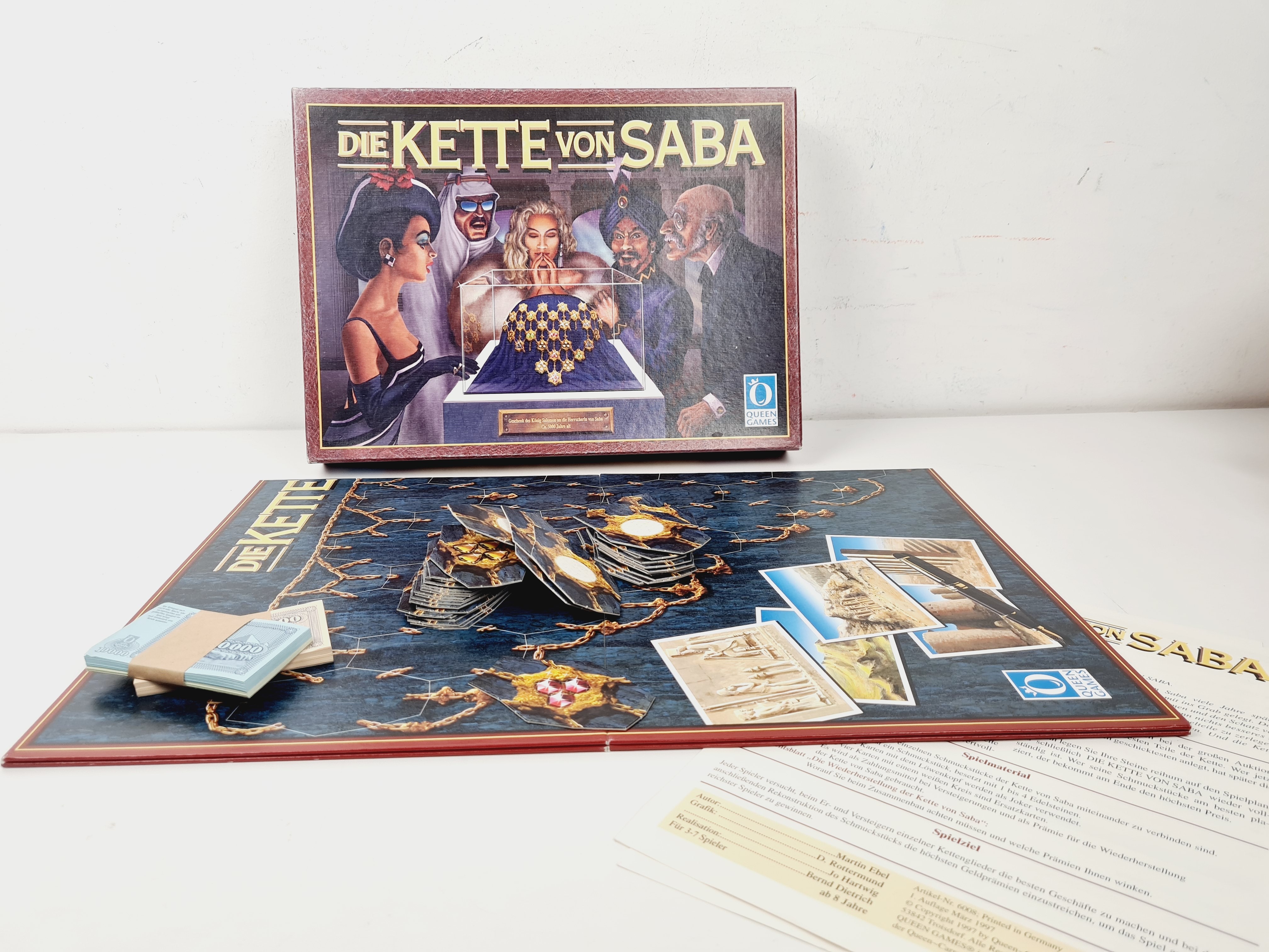 Voir photo 3 de Jeu de société vintage en allemand - Die kette von Saba - Queen games - 1997 - Dès 8 ans Jeu de société vintage en allemand - Die kette von Saba - Queen games - 1997 - Dès 8 ans Bon état reconditionné photo 3