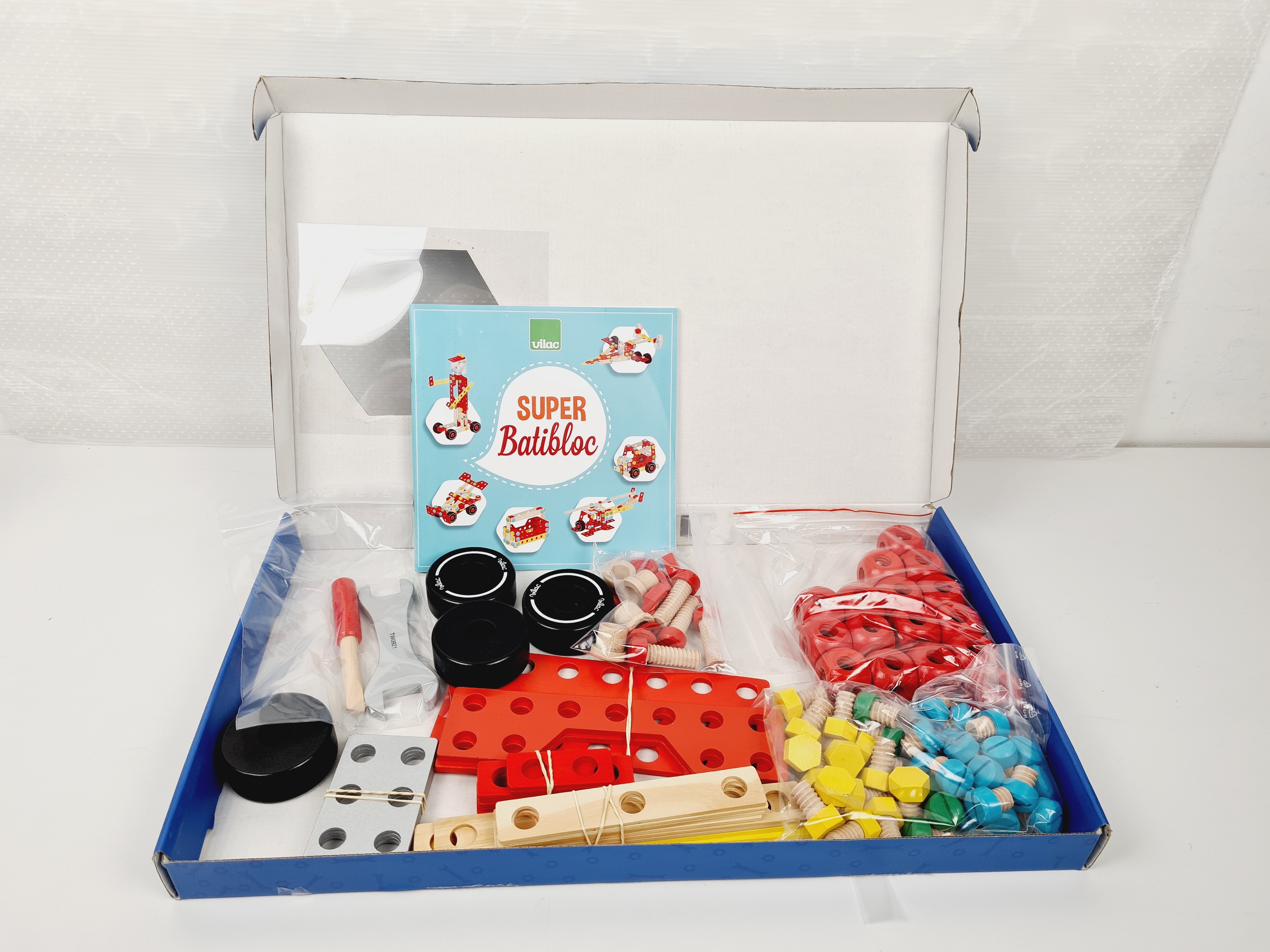 Voir photo 2 de Jeu en Bois - SUPER BATIBLOC - Mon coffre de construction - 4 ans + Jeu en Bois - SUPER BATIBLOC - Mon coffre de construction - 4 ans + Bon état reconditionné photo 2