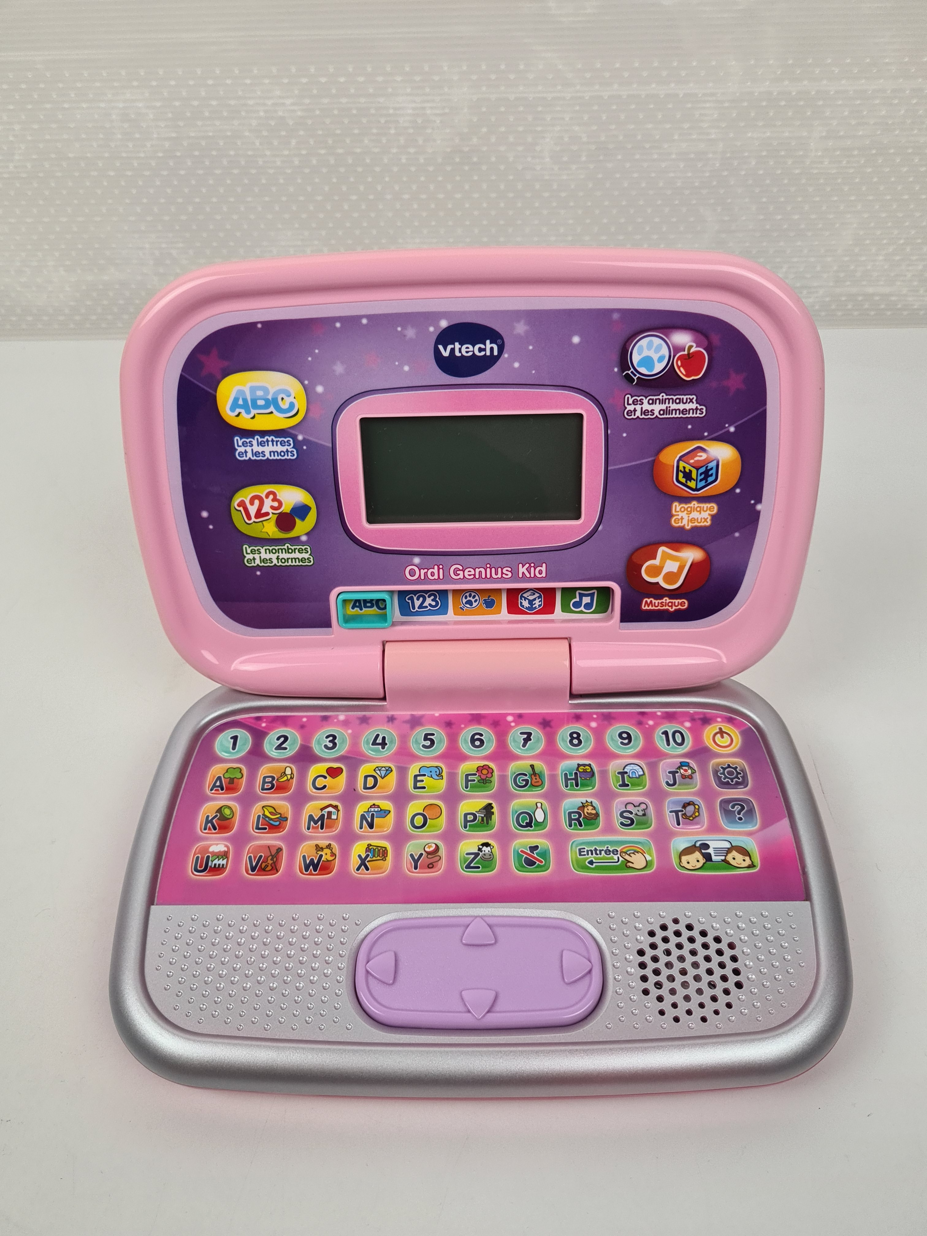 Voir photo 2 de Jouet 1er âge - ordinateur Ordi Genius Kid rose - Vtech - 3 ans + Jouet 1er âge - ordinateur Ordi Genius Kid rose - Vtech - 3 ans + Bon état reconditionné photo 2