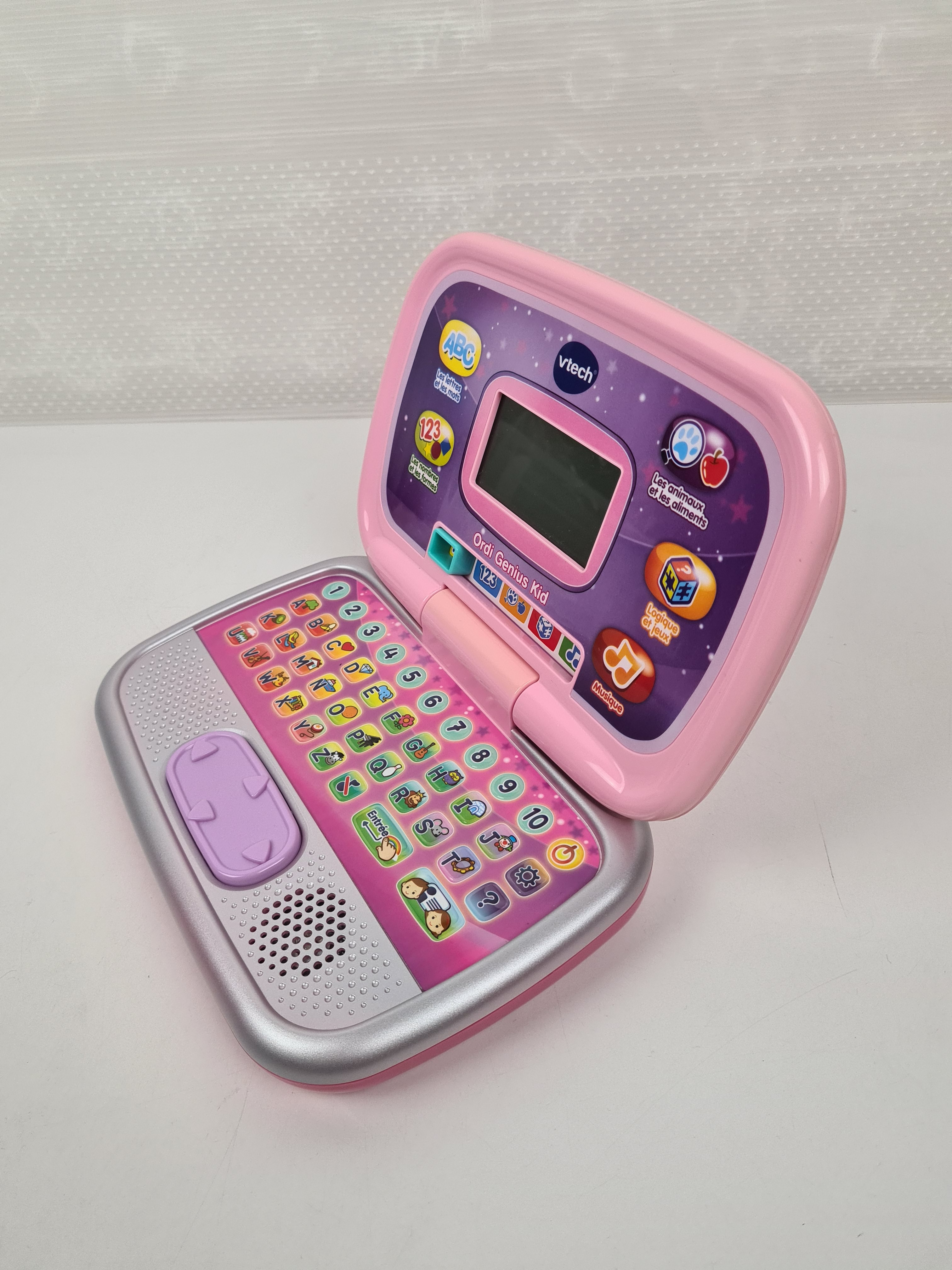 Voir photo 4 de Jouet 1er âge - ordinateur Ordi Genius Kid rose - Vtech - 3 ans + Jouet 1er âge - ordinateur Ordi Genius Kid rose - Vtech - 3 ans + Bon état reconditionné photo 4