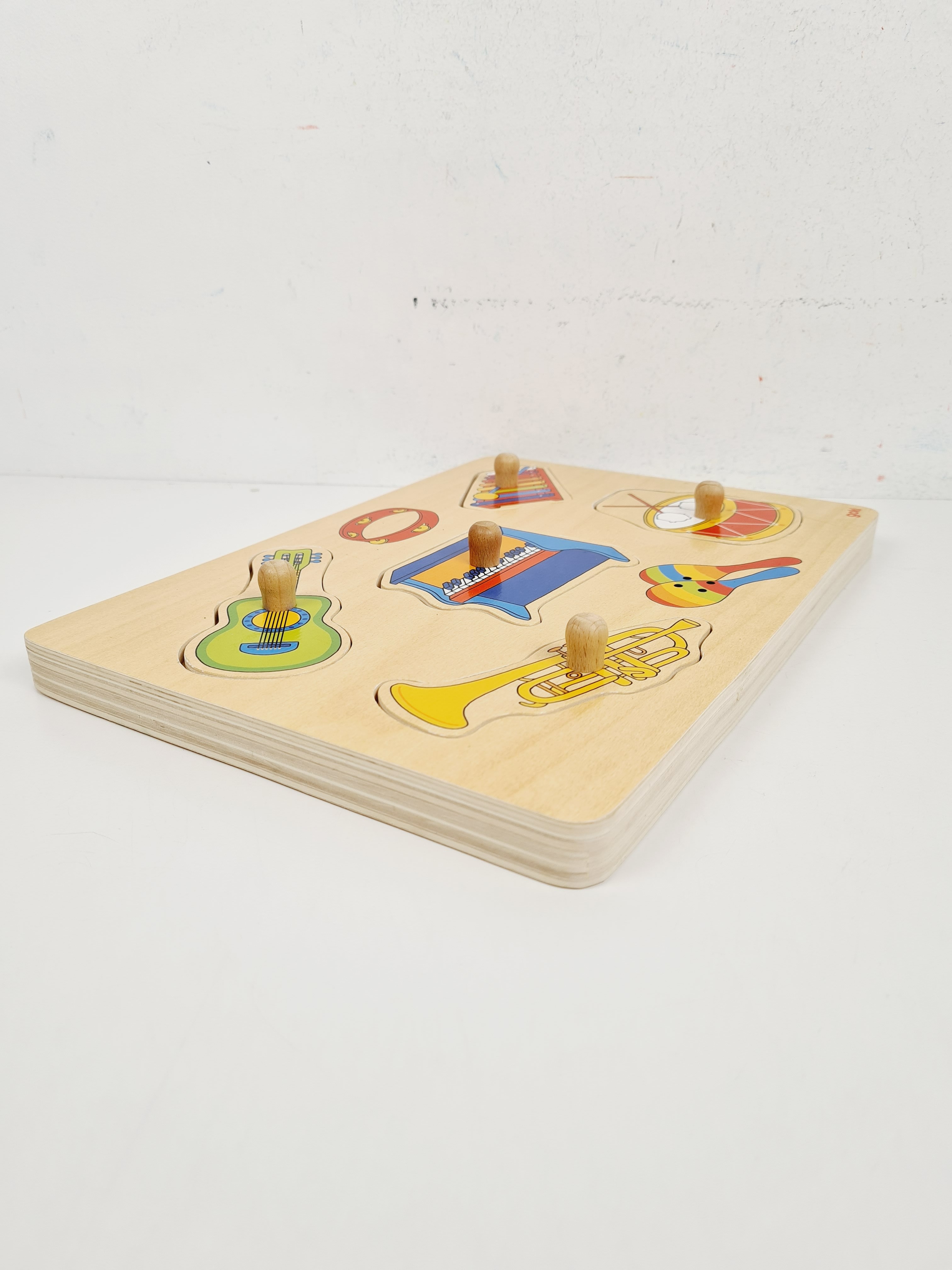 Voir photo 4 de Jouet en bois - Puzzle sonores instruments de musique - Goki - 3 ans + Jouet en bois - Puzzle sonores instruments de musique - Goki - 3 ans + Bon état reconditionné photo 4