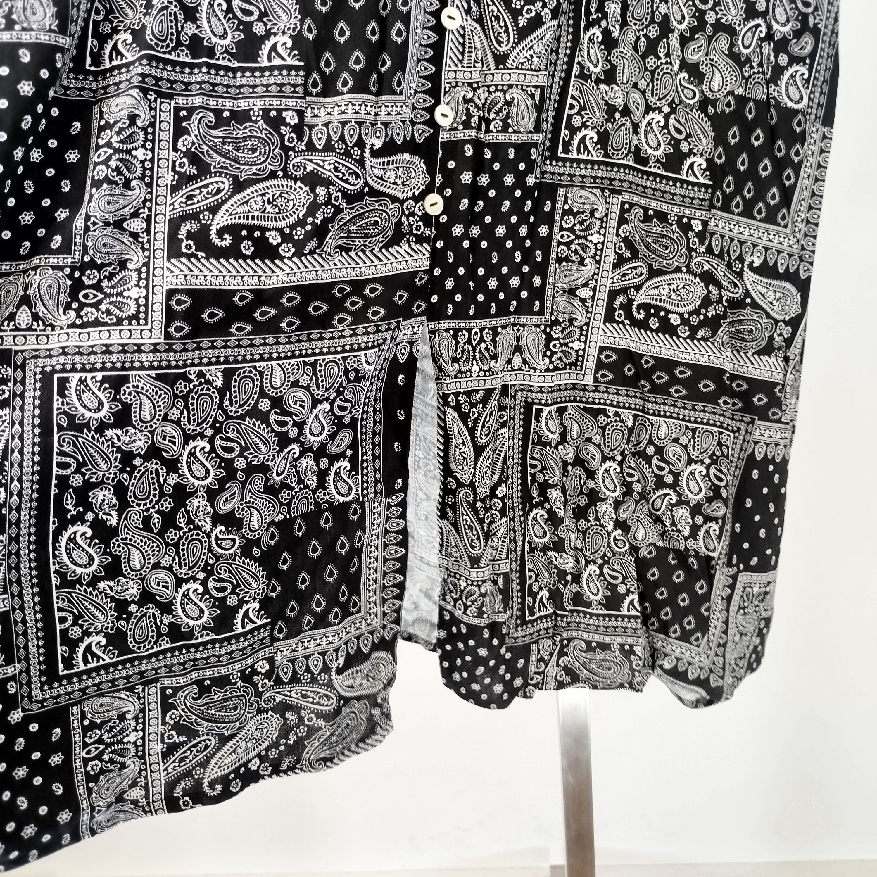 Voir photo 6 de Jupe longue noire et blanche motif cachemire boutonnée taille 42 Grain de Malice A3867 Jupe longue noire et blanche motif cachemire boutonnée taille 42 Grain de Malice A3867 Parfait état reconditionné photo 6