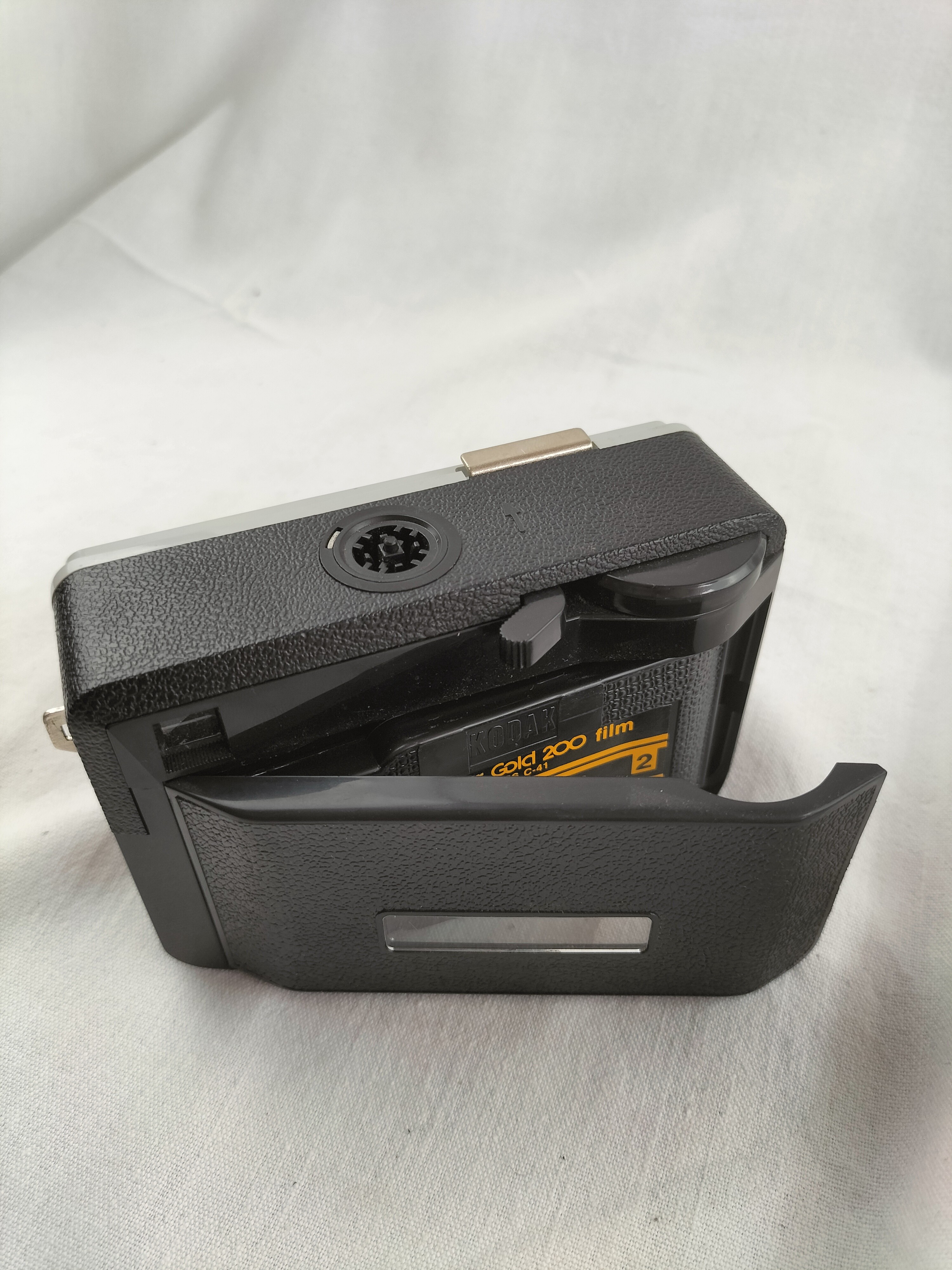 Voir photo 14 de Kodak Instamatic 56X avec viseur d'angle – Appareil photo vintage – Format 126 – Années 1970 Kodak Instamatic 56X avec viseur d'angle – Appareil photo vintage – Format 126 – Années 1970 Bon état reconditionné photo 14
