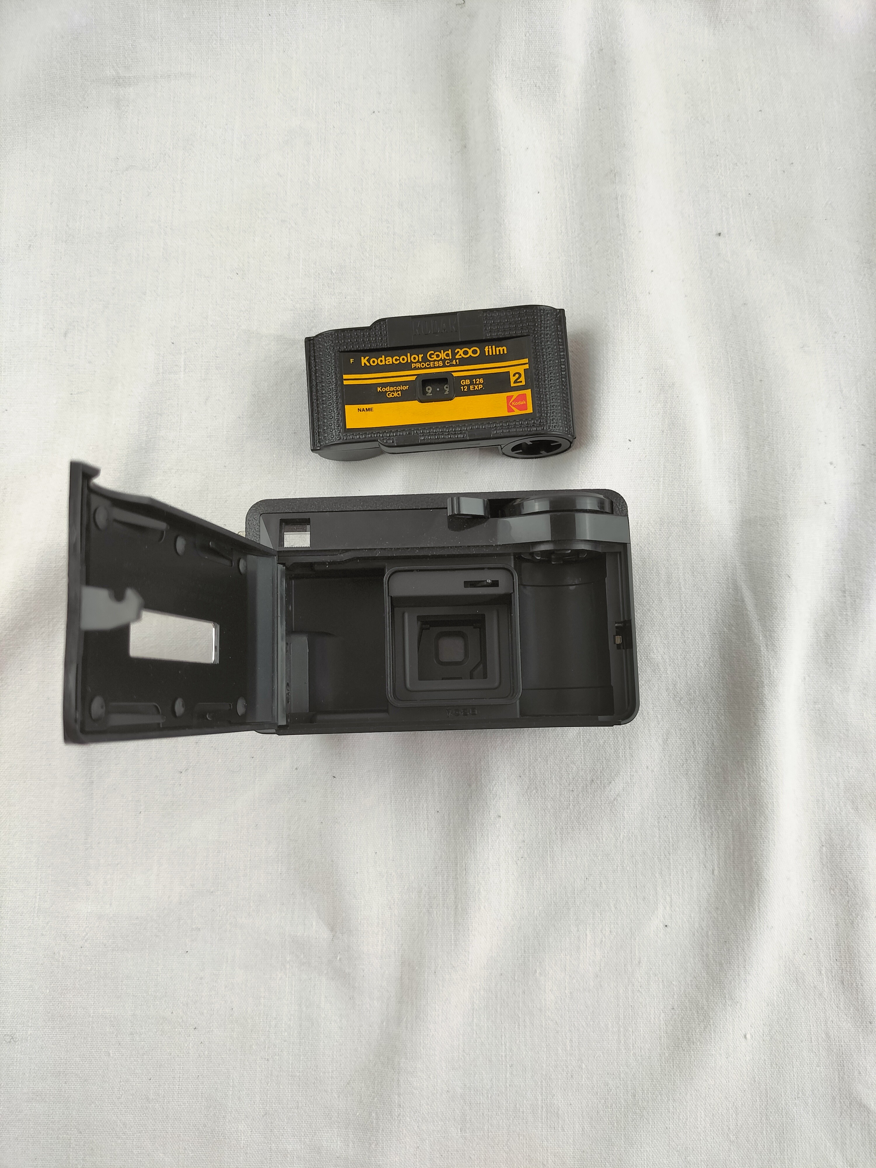 Voir photo 21 de Kodak Instamatic 56X avec viseur d'angle – Appareil photo vintage – Format 126 – Années 1970 Kodak Instamatic 56X avec viseur d'angle – Appareil photo vintage – Format 126 – Années 1970 Bon état reconditionné photo 21