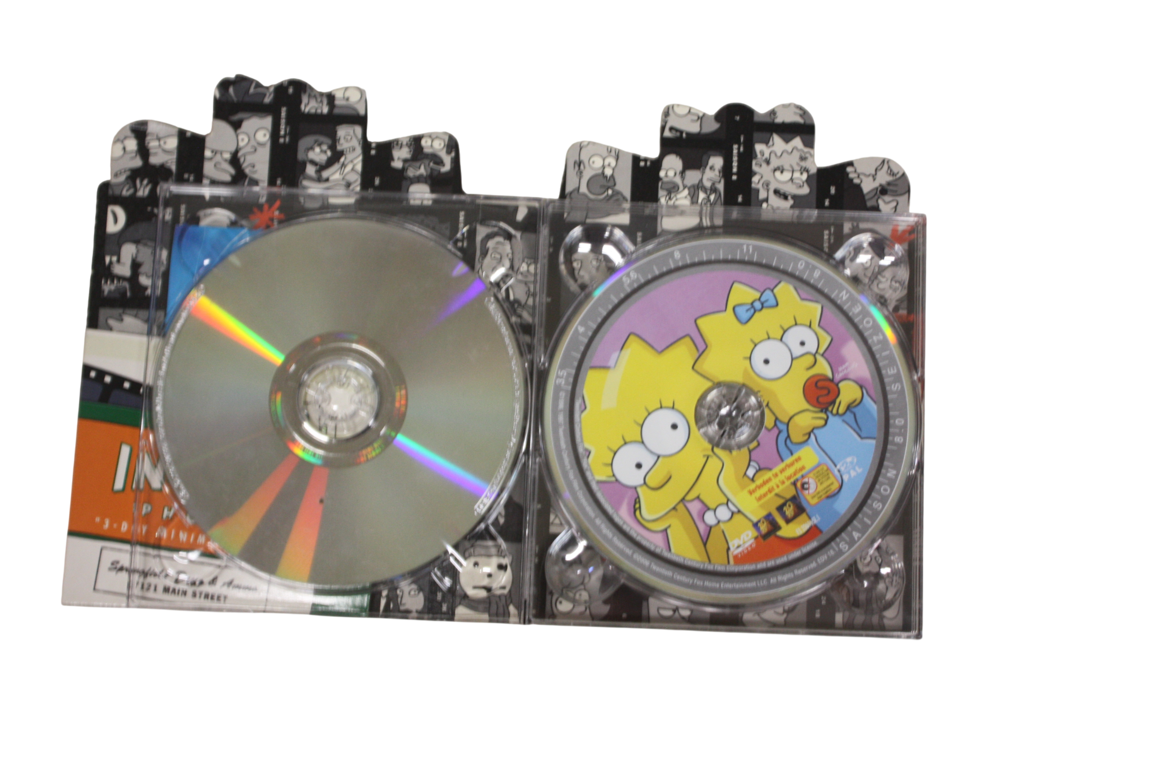 Voir photo 5 de Les Simpson Coffret intégral de la Saison 8 Édition collector Les Simpson Coffret intégral de la Saison 8 Édition collector reconditionné photo 5