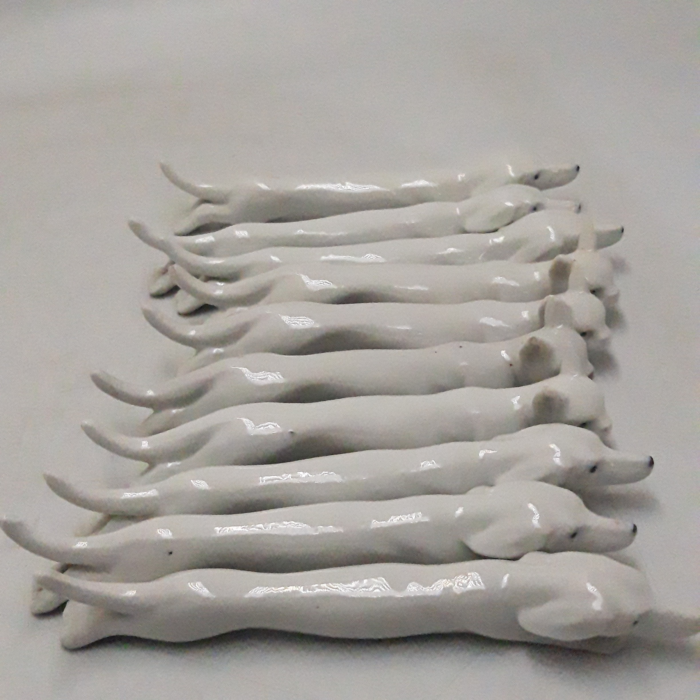 Voir photo 3 de Lot de 10 porte-couteaux en porcelaine blanche Lot de 10 porte-couteaux en porcelaine blanche Bon état reconditionné photo 3