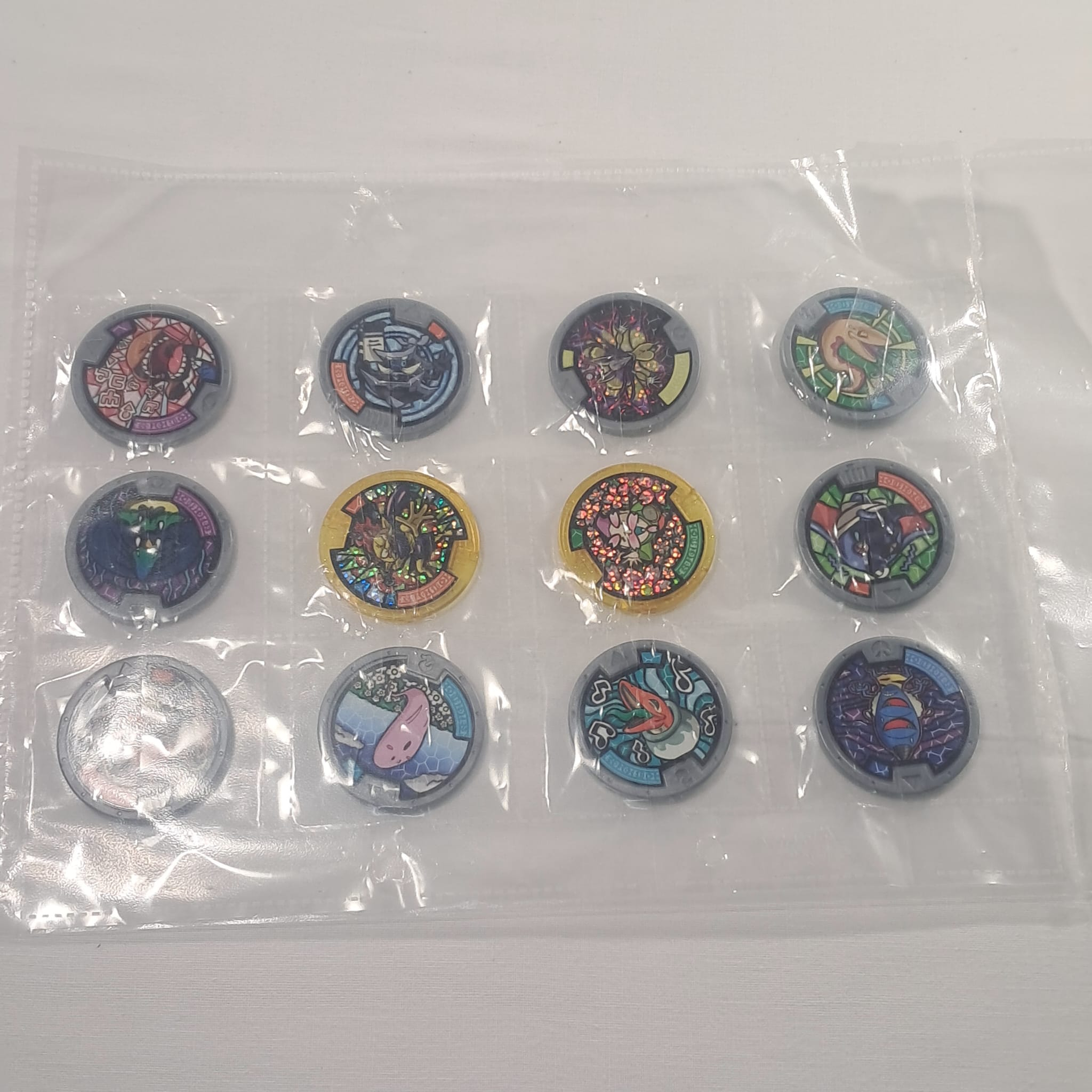 Voir photo 2 de Lot de 12 médaillons Yo-Kai Watch Lot de 12 médaillons Yo-Kai Watch Très bon état reconditionné photo 2