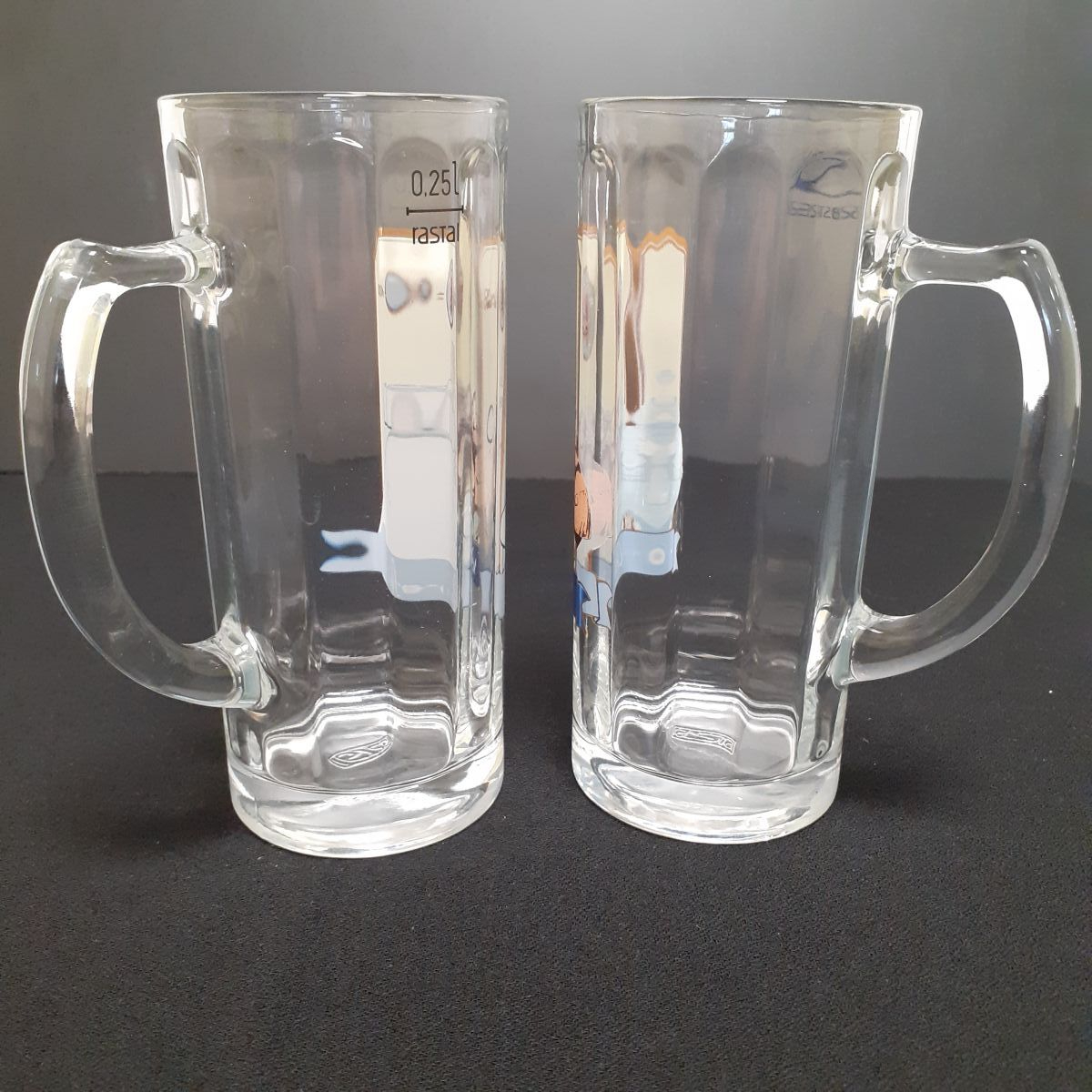 Voir photo 2 de Lot de 2 chopes à bière Paulaner de 25 cl - October Fest. Lot de 2 chopes à bière Paulaner de 25 cl - October Fest. Bon état reconditionné photo 2