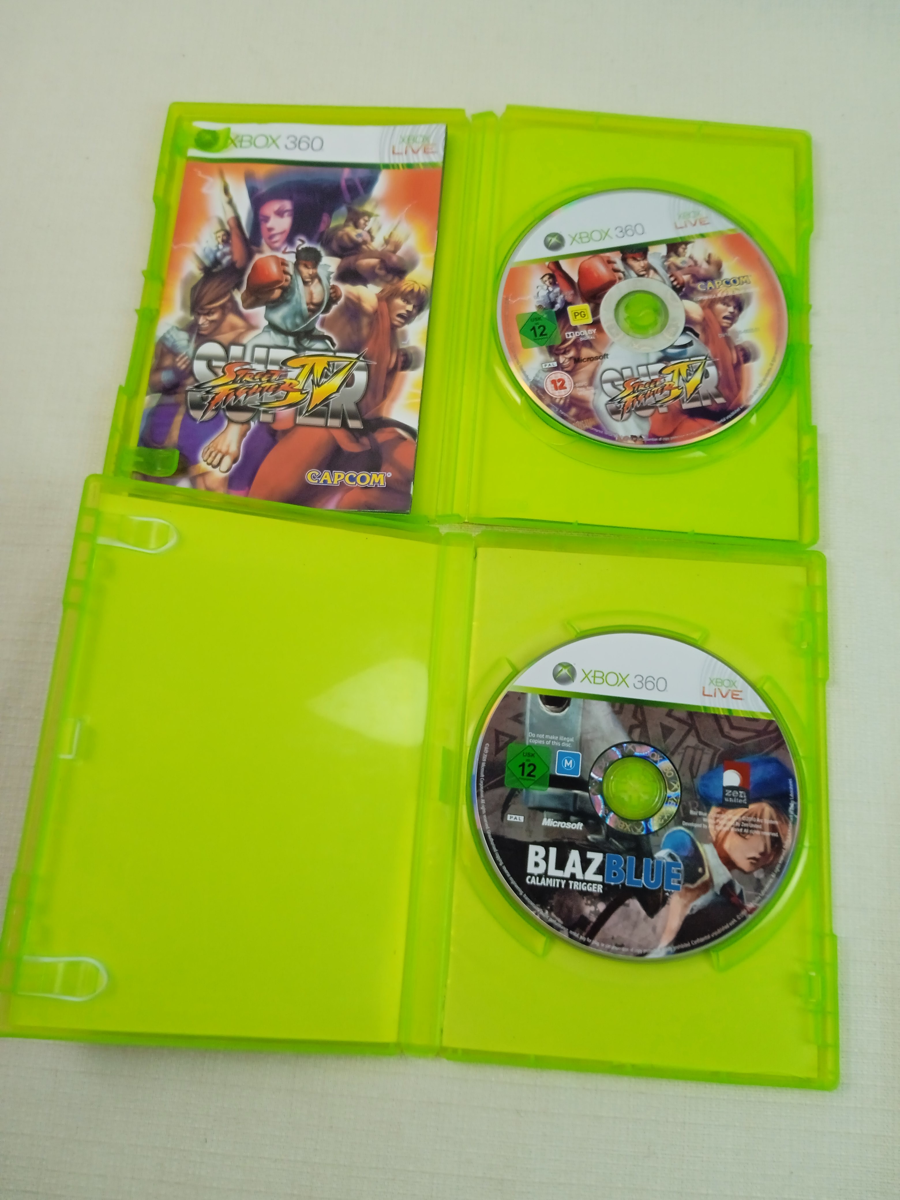 Voir photo 2 de Lot de 2 jeux Xbox 360 "Meilleur jeu de combat" Lot de 2 jeux Xbox 360 "Meilleur jeu de combat" Bon état reconditionné photo 2