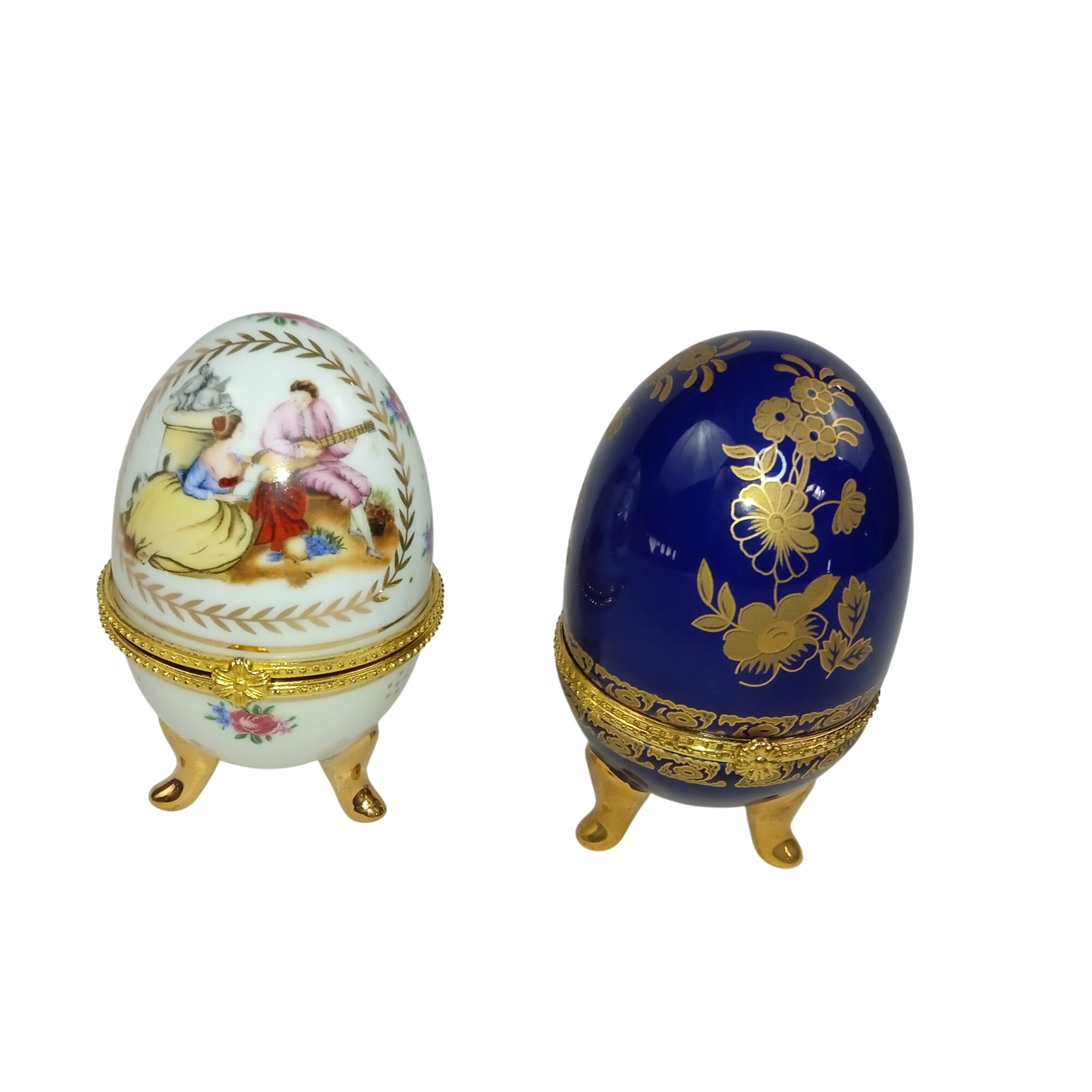 Lot de 2 œufs en porcelaine sur pieds style Fabergé - 22,00 € Lot de 2 œufs en porcelaine sur pieds style Fabergé reconditionné disponible sur Label Emmaüs