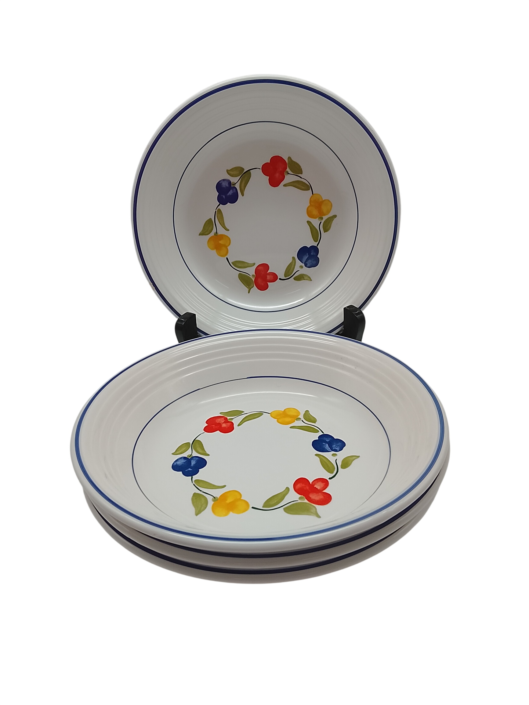 Lot de 4 assiettes creuses printanières en faïence - 10,00 € Lot de 4 assiettes creuses printanières en faïence reconditionné disponible sur Label Emmaüs