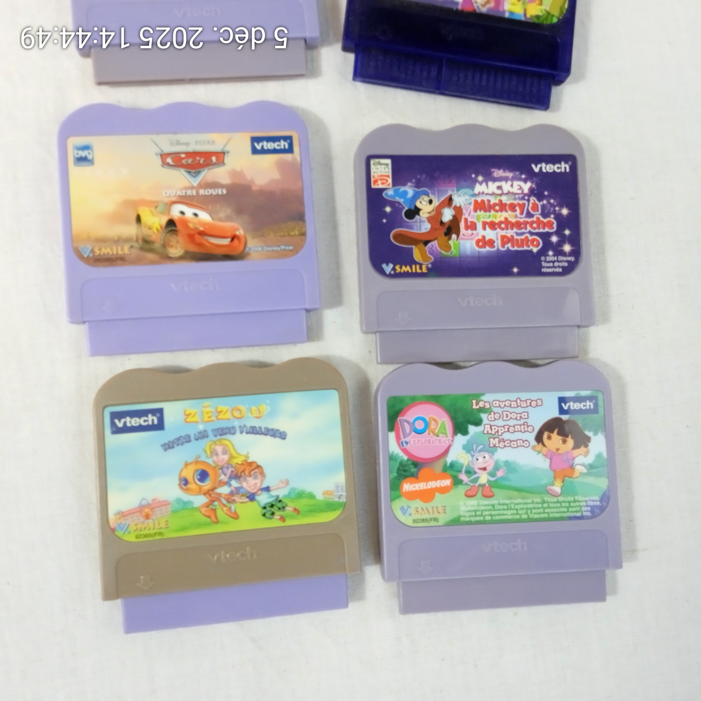 Voir photo 4 de Lot De 4 Jeux Vtech Pour V.Smile Lot De 4 Jeux Vtech Pour V.Smile Bon état reconditionné photo 4