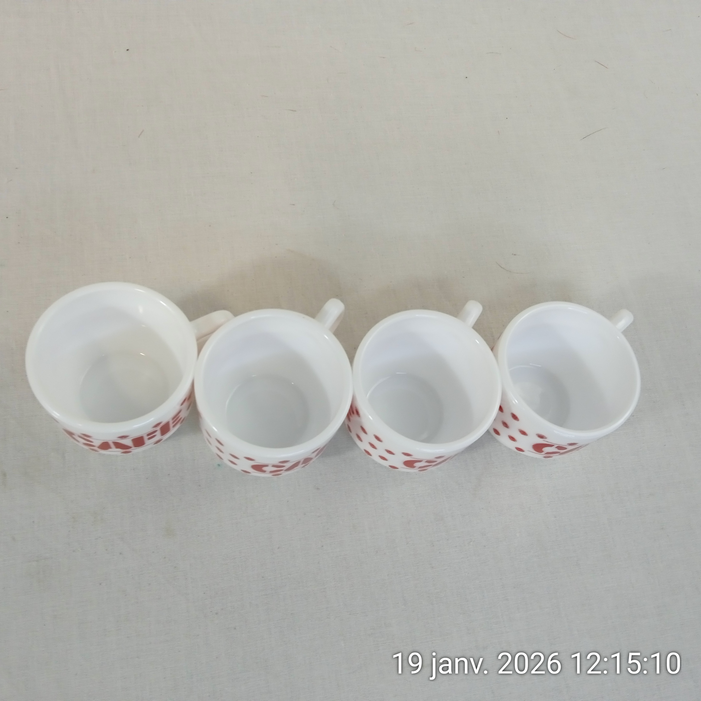 Voir photo 4 de Lot de 4 tasses CAFÉ en verre opale Arcopal France Lot de 4 tasses CAFÉ en verre opale Arcopal France Très bon état reconditionné photo 4