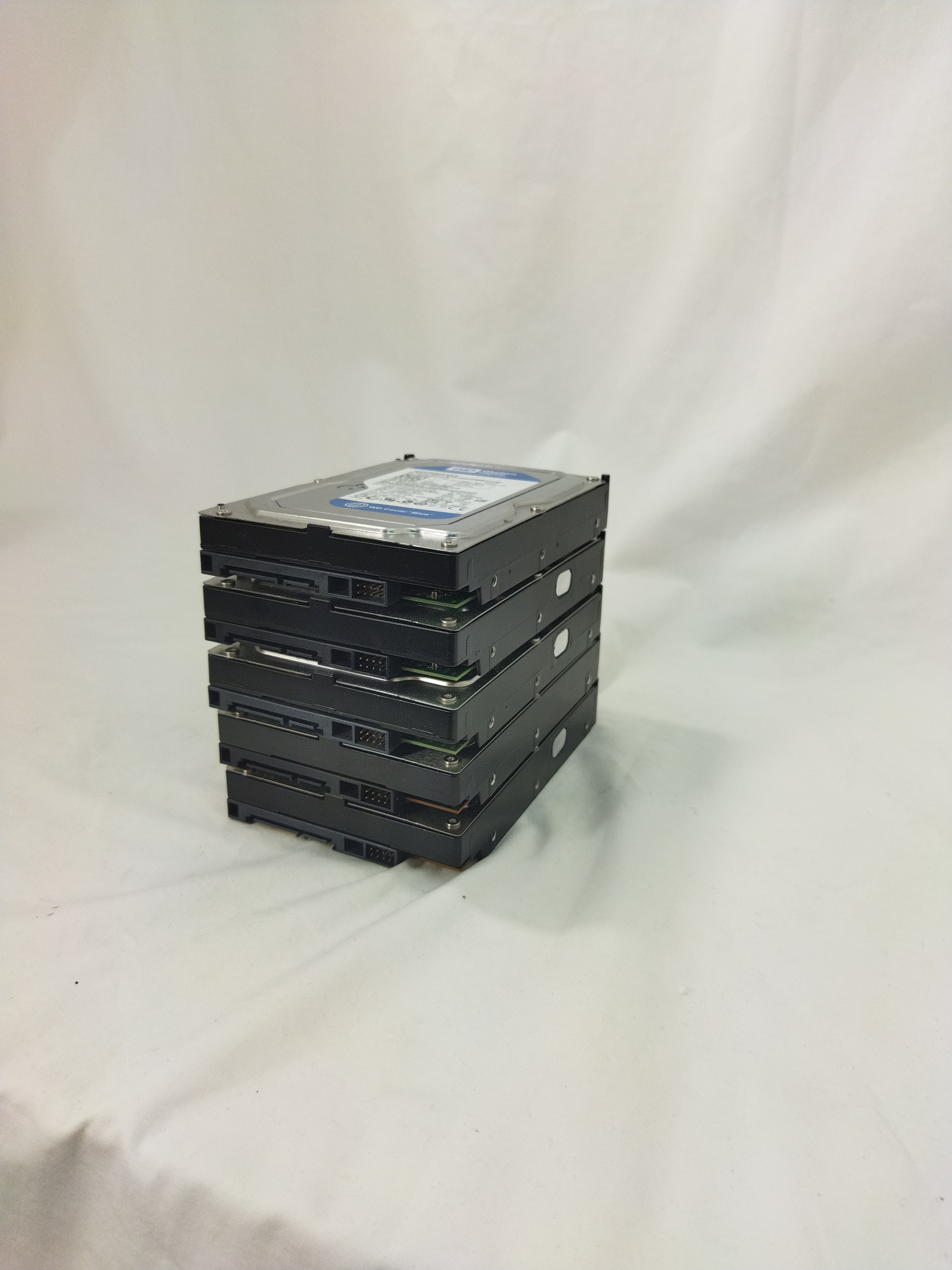 Voir photo 2 de Lot de 5 disques dur de 250 Go de Western Digital Lot de 5 disques dur de 250 Go de Western Digital Très bon état reconditionné photo 2