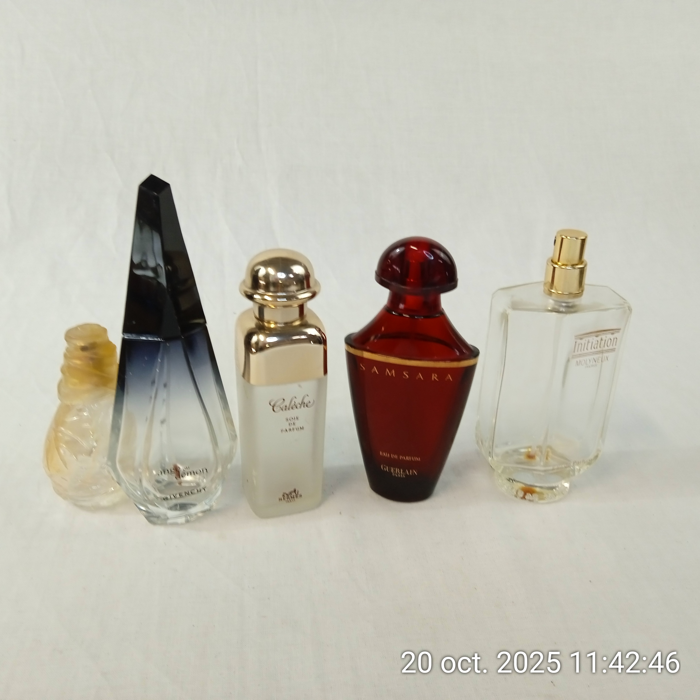 Voir photo 2 de Lot de 5 flacons de parfum Guerlain Givenchy Hermès Kenzo Molyneux Lot de 5 flacons de parfum Guerlain Givenchy Hermès Kenzo Molyneux Bon état reconditionné photo 2