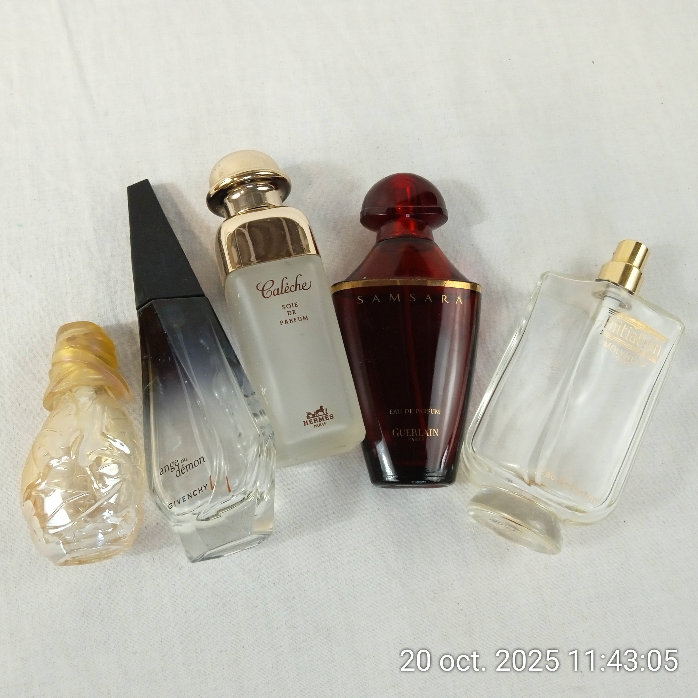 Voir photo 4 de Lot de 5 flacons de parfum Guerlain Givenchy Hermès Kenzo Molyneux Lot de 5 flacons de parfum Guerlain Givenchy Hermès Kenzo Molyneux Bon état reconditionné photo 4