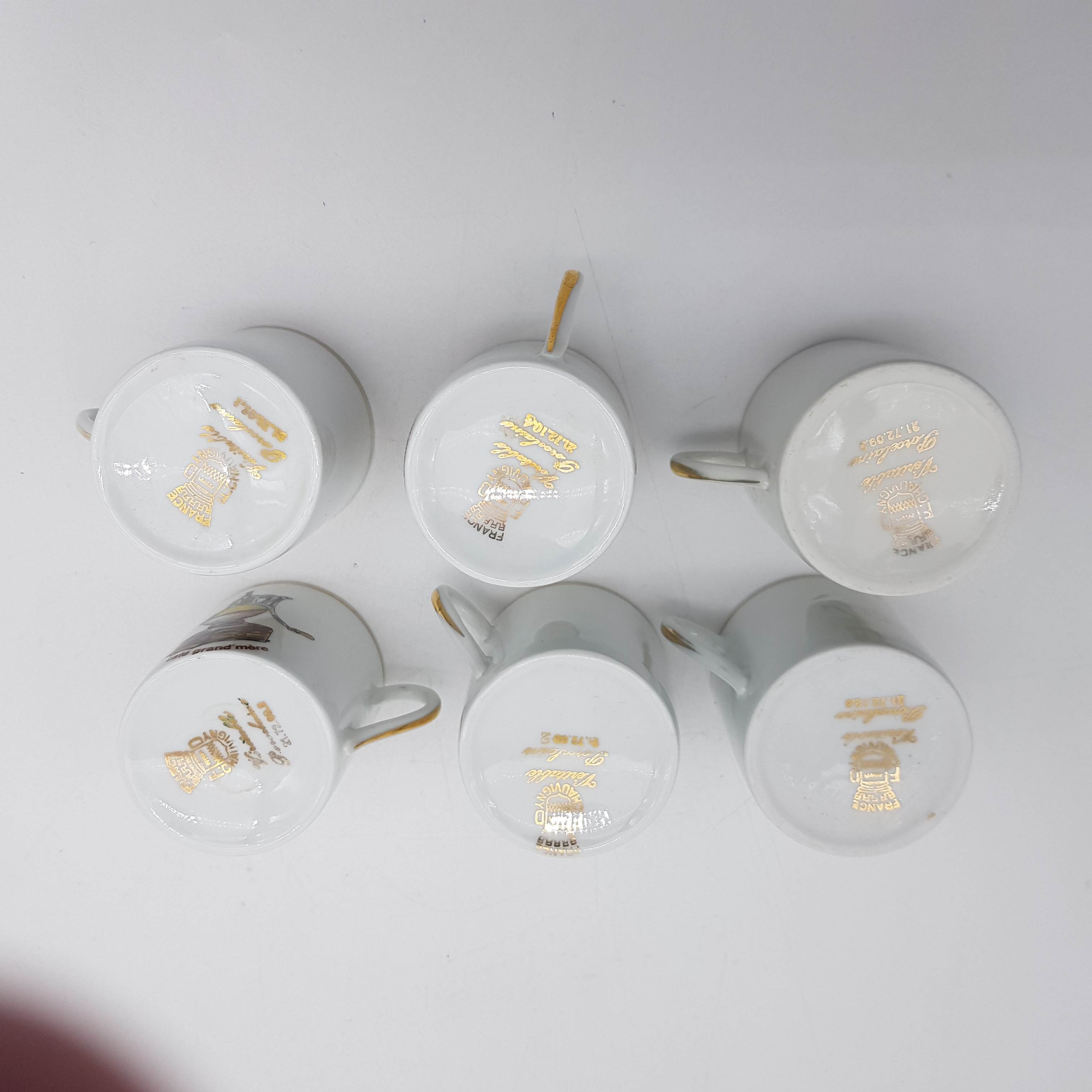 Voir photo 4 de Lot de 6 tasses en porcelaine Chauvigny Lot de 6 tasses en porcelaine Chauvigny Bon état reconditionné photo 4