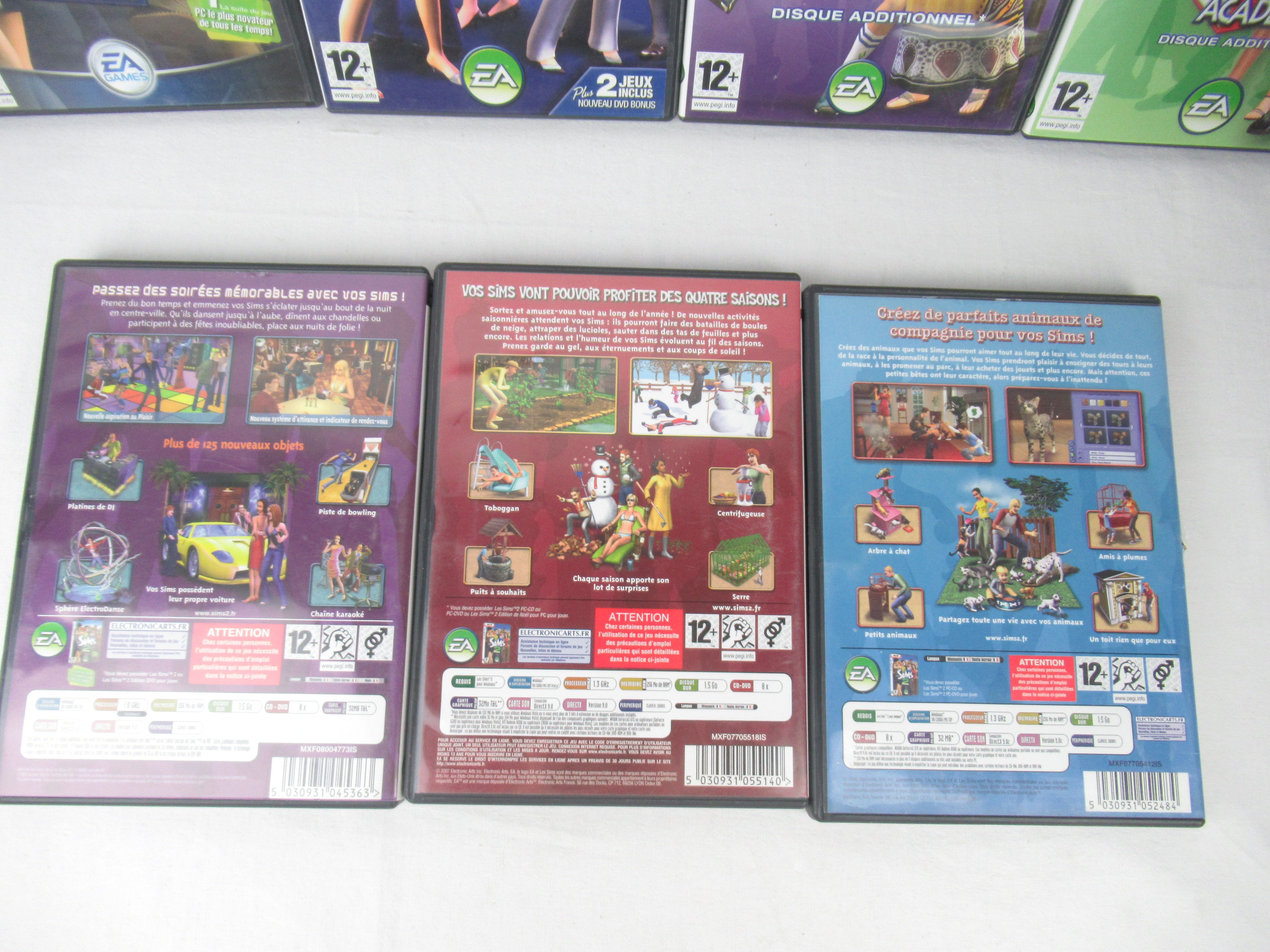 Voir photo 4 de Lot de 7 jeux Les Sims 2 en bon état Lot de 7 jeux Les Sims 2 en bon état Bon état reconditionné photo 4