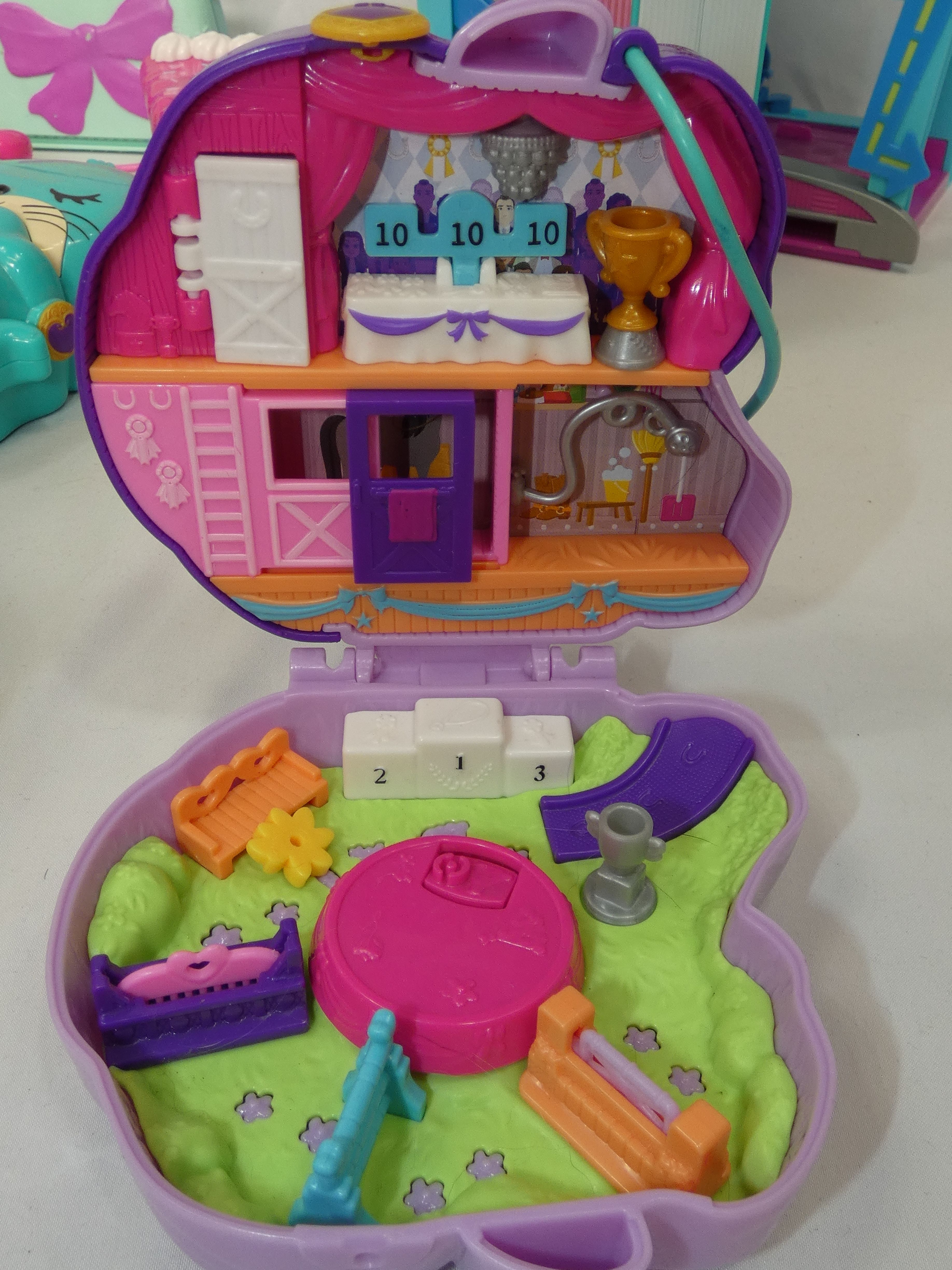 Voir photo 10 de Lot de jouets Polly Pocket vendu en l'état en vrac de modèles et d'époques différentes 9 Kg Lot de jouets Polly Pocket vendu en l'état en vrac de modèles et d'époques différentes 9 Kg Bon état reconditionné photo 10