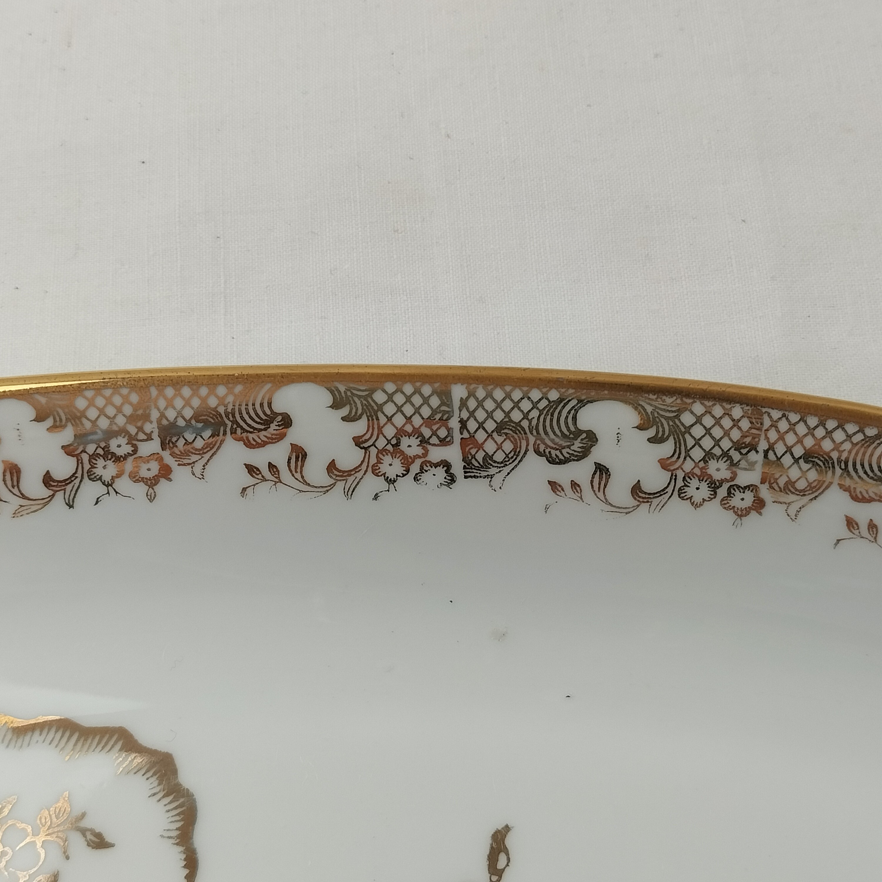Voir photo 14 de Lot de plat ovale et saucière Oiseaux du Paradis "Porcelaine Véritable" Lot de plat ovale et saucière Oiseaux du Paradis "Porcelaine Véritable" Bon état reconditionné photo 14