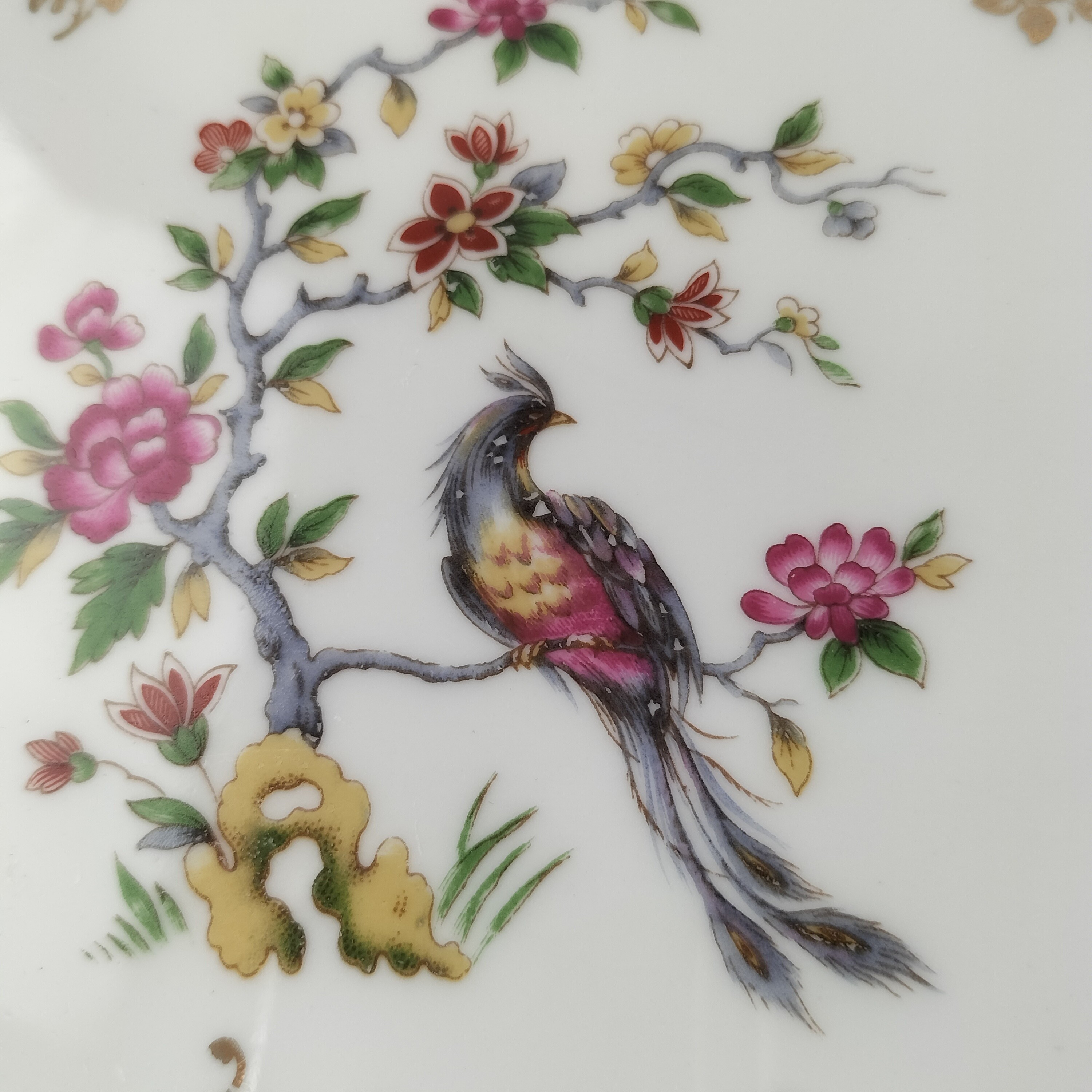 Voir photo 15 de Lot de plat ovale et saucière Oiseaux du Paradis "Porcelaine Véritable" Lot de plat ovale et saucière Oiseaux du Paradis "Porcelaine Véritable" Bon état reconditionné photo 15