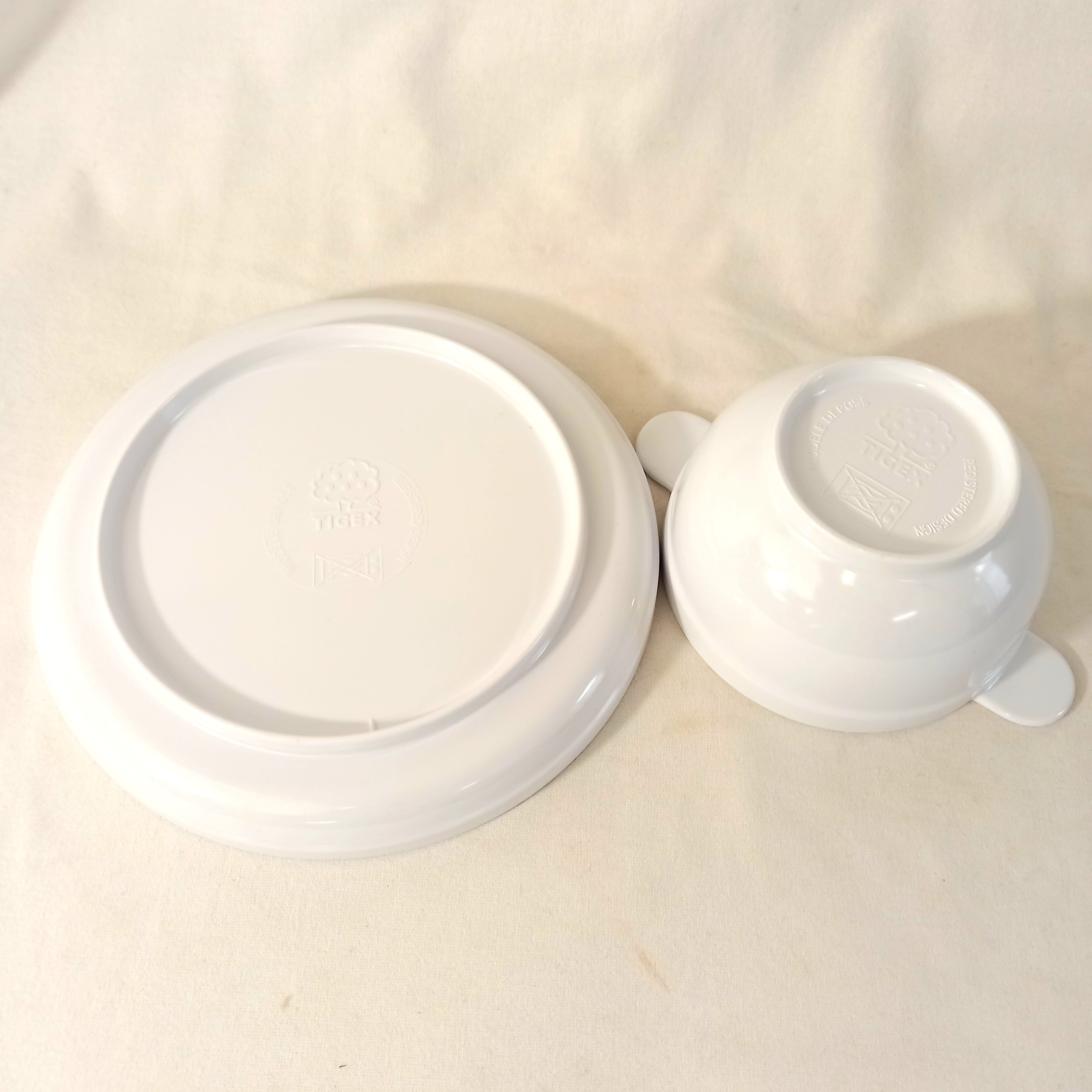 Voir photo 2 de Lot Disney composé d'une assiette creuse et d'un bol en mélamine, de marque Tigex Lot Disney composé d'une assiette creuse et d'un bol en mélamine, de marque Tigex Très bon état reconditionné photo 2
