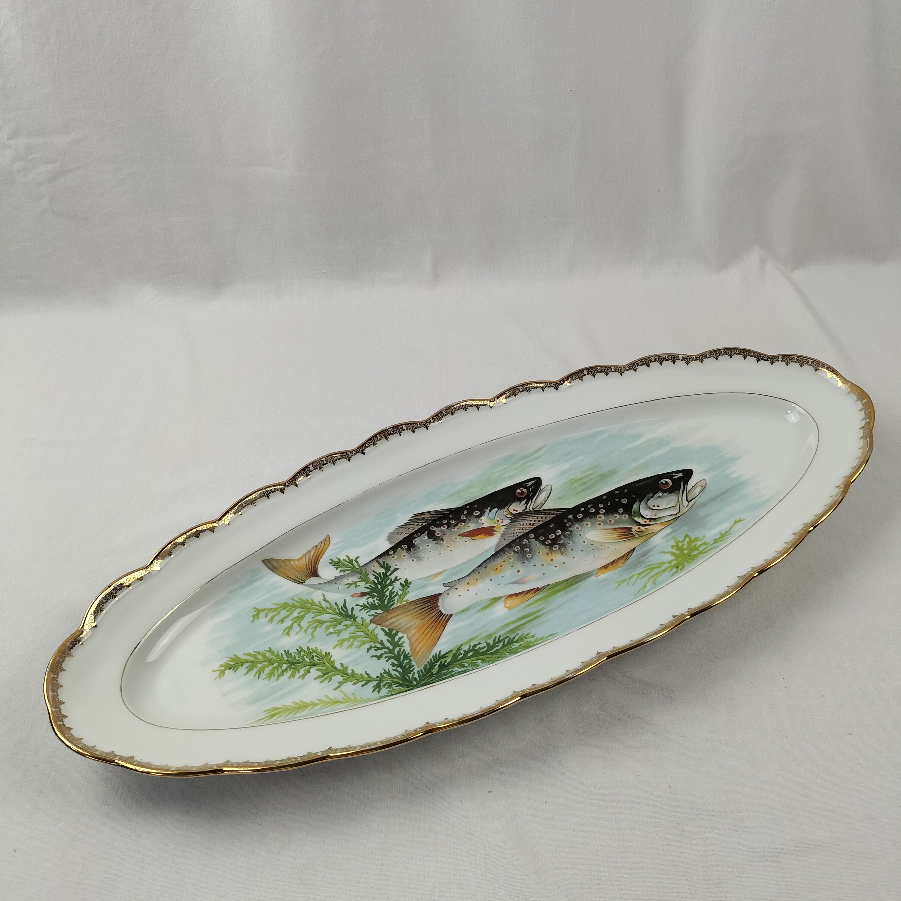 Voir photo 4 de Magnifique grand plat de service ovale "Poisson" en porcelaine lourde "Pommer Dureil" l'Etoile Porcelaine Magnifique grand plat de service ovale "Poisson" en porcelaine lourde "Pommer Dureil" l'Etoile Porcelaine Bon état reconditionné photo 4