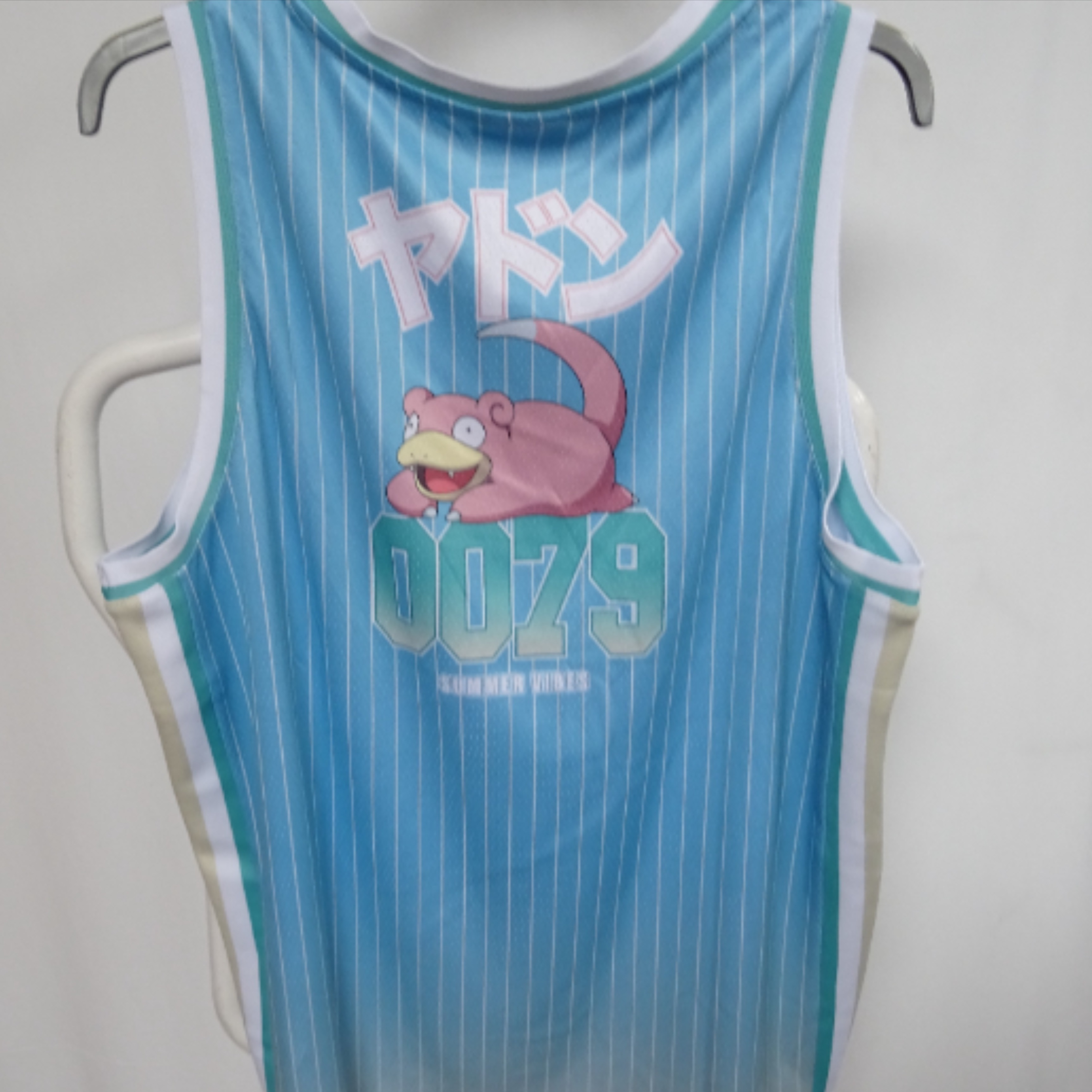 Voir photo 3 de Maillot de basket Pokémon Ramoloss taille s Maillot de basket Pokémon Ramoloss taille s Parfait état reconditionné photo 3