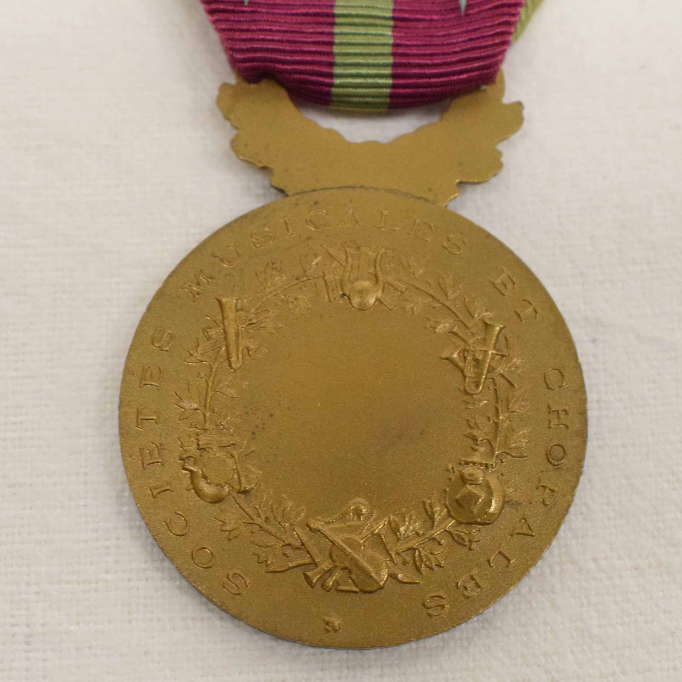 Voir photo 3 de Médaille en bronze sociétés musicales et chorales et sa réduction métal Médaille en bronze sociétés musicales et chorales et sa réduction métal Bon état reconditionné photo 3
