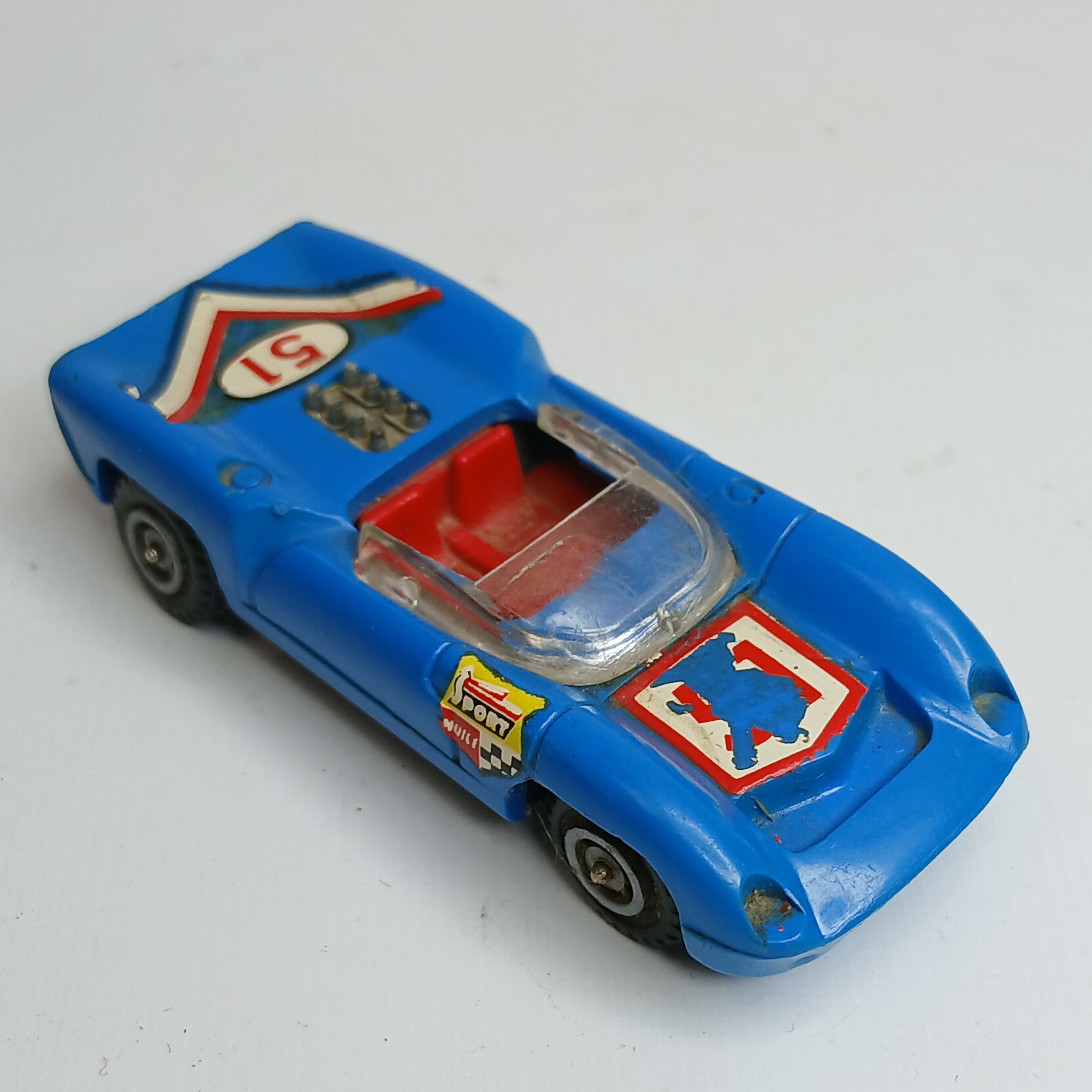 Voir photo 2 de Miniature CHAMPION - Lola T-70 (années 1960/70).Made in France - Echelle 1/64ème. Miniature CHAMPION - Lola T-70 (années 1960/70).Made in France - Echelle 1/64ème. État correct reconditionné photo 2