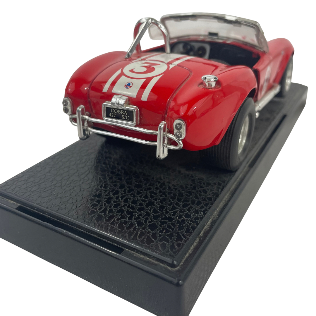 Voir photo 10 de Miniature Shelby Cobra 427 S/C - Rouge à bandes blanches - Échelle 1/24 Miniature Shelby Cobra 427 S/C - Rouge à bandes blanches - Échelle 1/24 Très bon état reconditionné photo 10