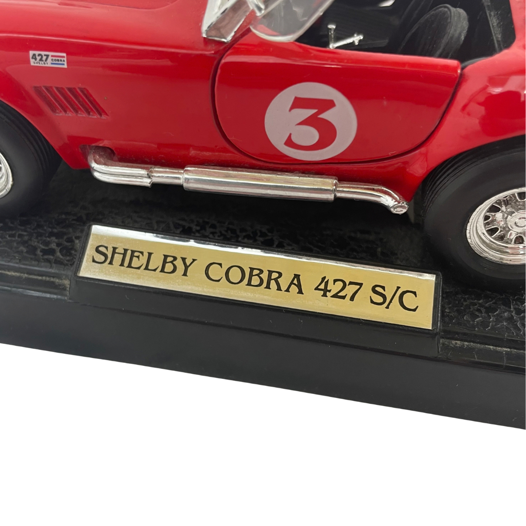 Voir photo 11 de Miniature Shelby Cobra 427 S/C - Rouge à bandes blanches - Échelle 1/24 Miniature Shelby Cobra 427 S/C - Rouge à bandes blanches - Échelle 1/24 Très bon état reconditionné photo 11