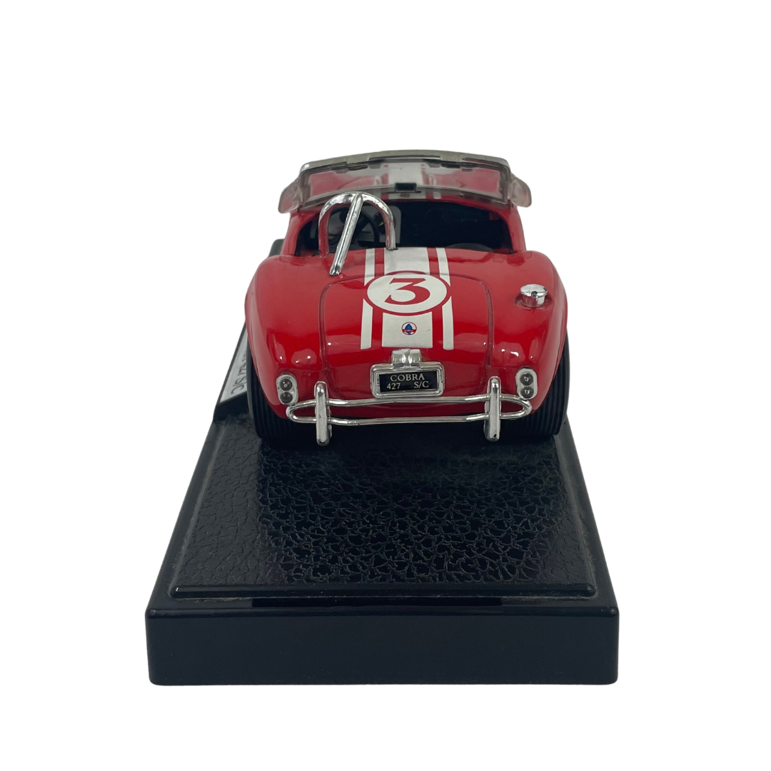 Voir photo 4 de Miniature Shelby Cobra 427 S/C - Rouge à bandes blanches - Échelle 1/24 Miniature Shelby Cobra 427 S/C - Rouge à bandes blanches - Échelle 1/24 Très bon état reconditionné photo 4