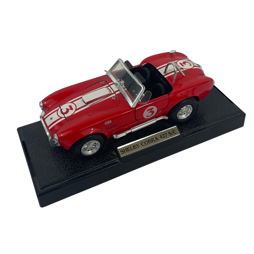 Voir photo 5 de Miniature Shelby Cobra 427 S/C - Rouge à bandes blanches - Échelle 1/24 Miniature Shelby Cobra 427 S/C - Rouge à bandes blanches - Échelle 1/24 Très bon état reconditionné photo 5