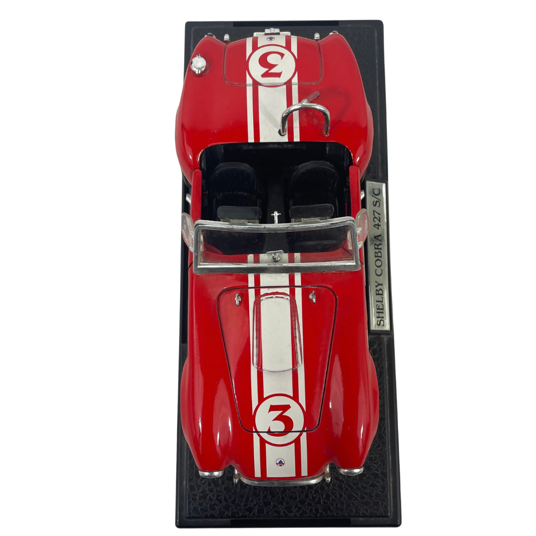 Voir photo 6 de Miniature Shelby Cobra 427 S/C - Rouge à bandes blanches - Échelle 1/24 Miniature Shelby Cobra 427 S/C - Rouge à bandes blanches - Échelle 1/24 Très bon état reconditionné photo 6