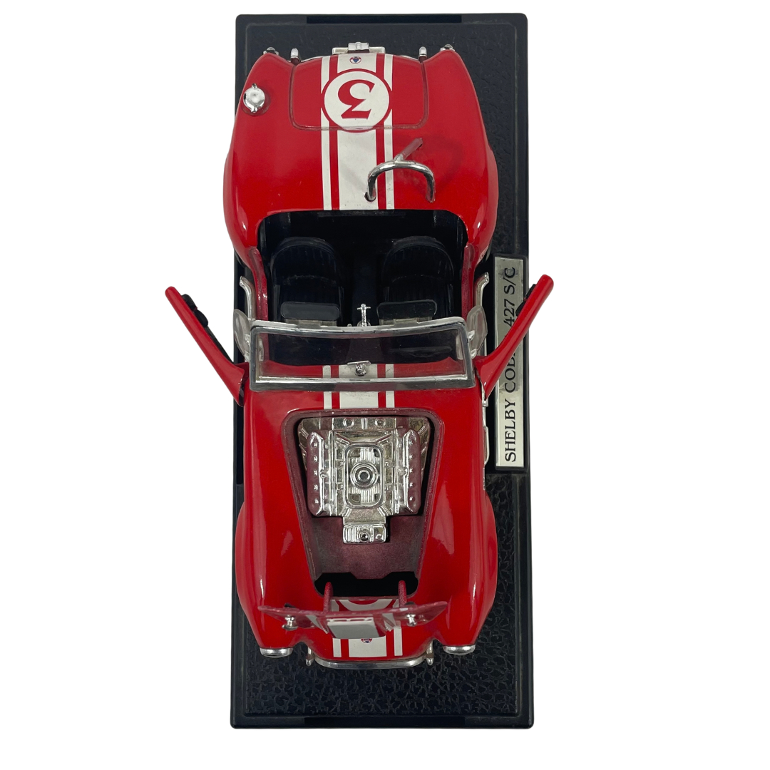 Voir photo 8 de Miniature Shelby Cobra 427 S/C - Rouge à bandes blanches - Échelle 1/24 Miniature Shelby Cobra 427 S/C - Rouge à bandes blanches - Échelle 1/24 Très bon état reconditionné photo 8