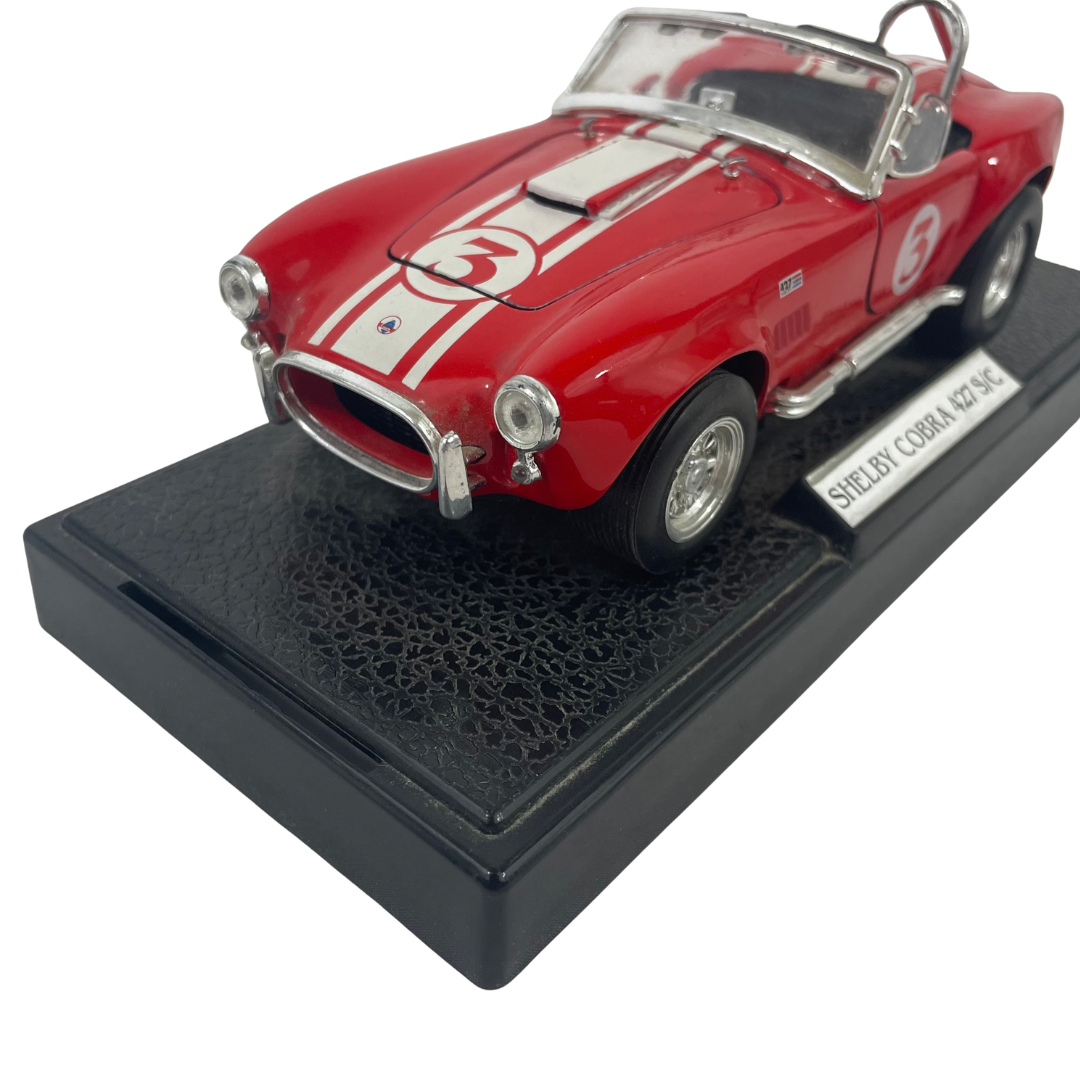 Voir photo 9 de Miniature Shelby Cobra 427 S/C - Rouge à bandes blanches - Échelle 1/24 Miniature Shelby Cobra 427 S/C - Rouge à bandes blanches - Échelle 1/24 Très bon état reconditionné photo 9