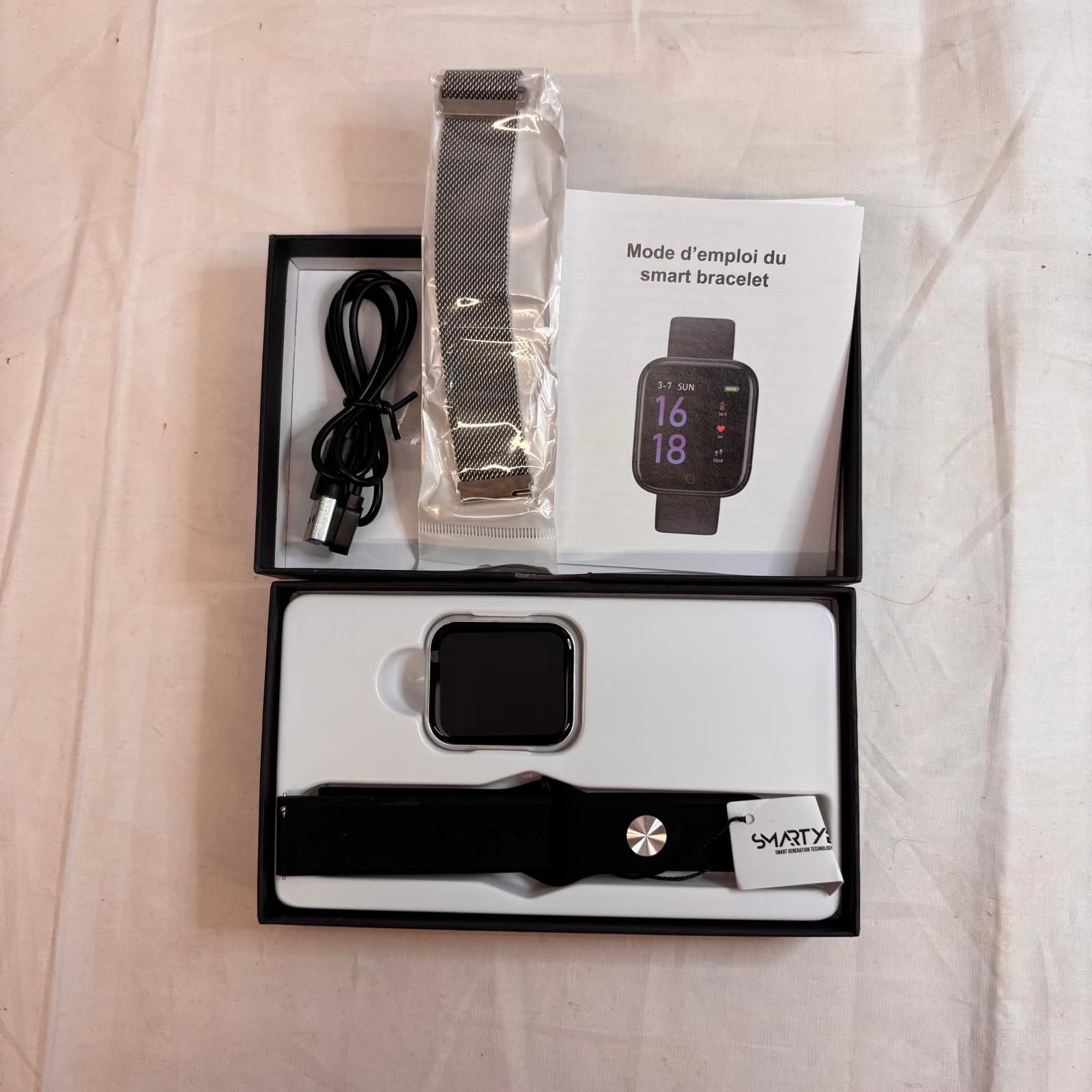 Voir photo 2 de Montre connectée Smarty 2.0 Wellness - SW013B Argent Montre connectée Smarty 2.0 Wellness - SW013B Argent très bon état reconditionné photo 2