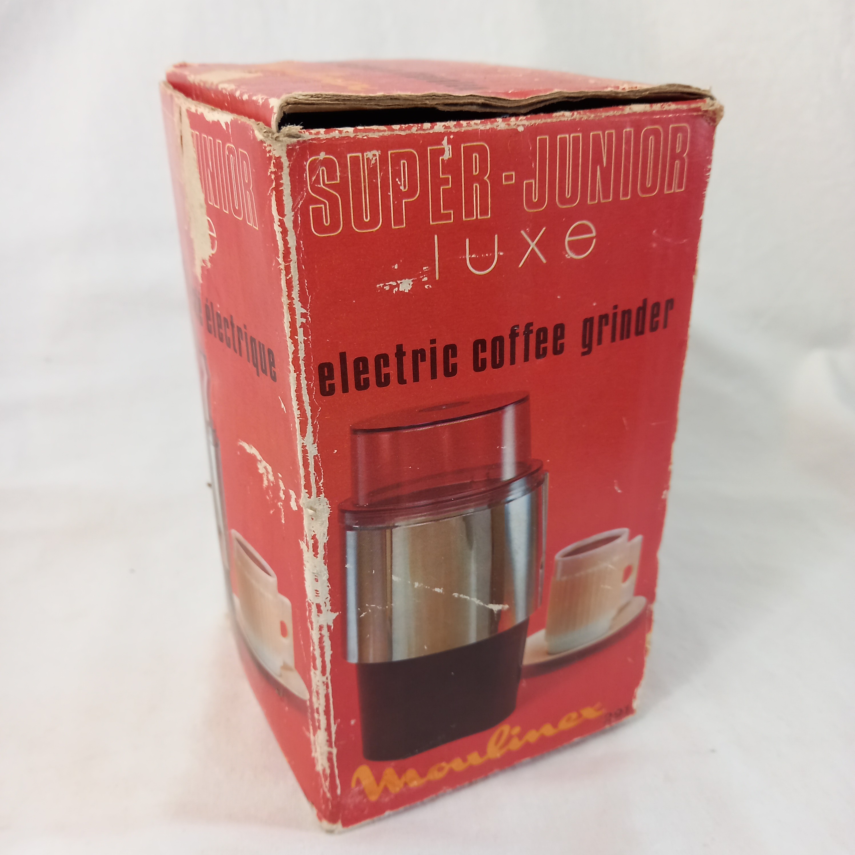 Voir photo 14 de Moulin à café électrique VINTAGE noir et chromé, modèle "super junior luxe", de marque Moulinex (années 1970) Moulin à café électrique VINTAGE noir et chromé, modèle "super junior luxe", de marque Moulinex (années 1970) Bon état reconditionné photo 14