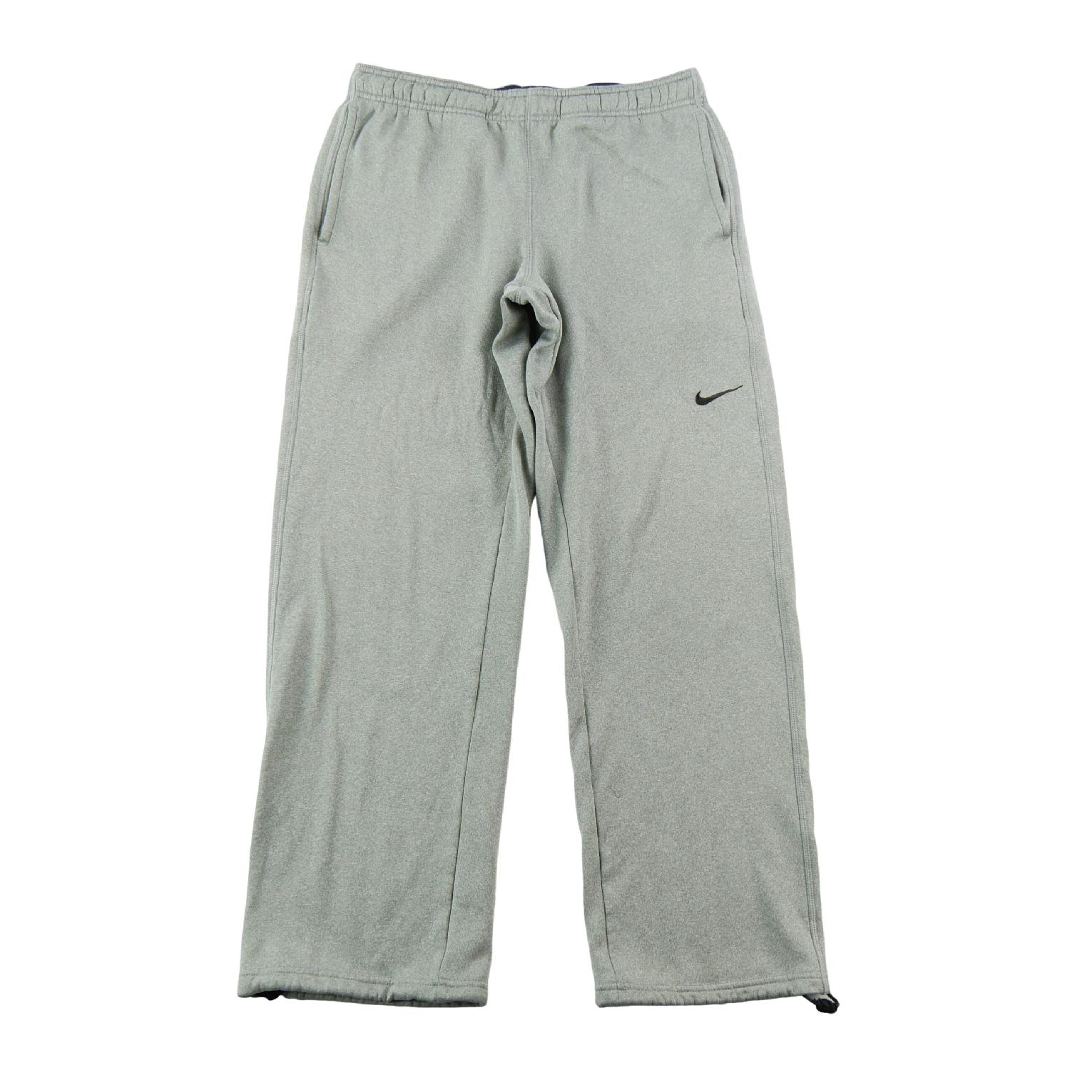 Nike Jogging Therma-FIT Bas ouverts réglables Pantalon training Swoosh brodé Homme Taille S Très bon état Nike reconditionné disponible sur Sporteed