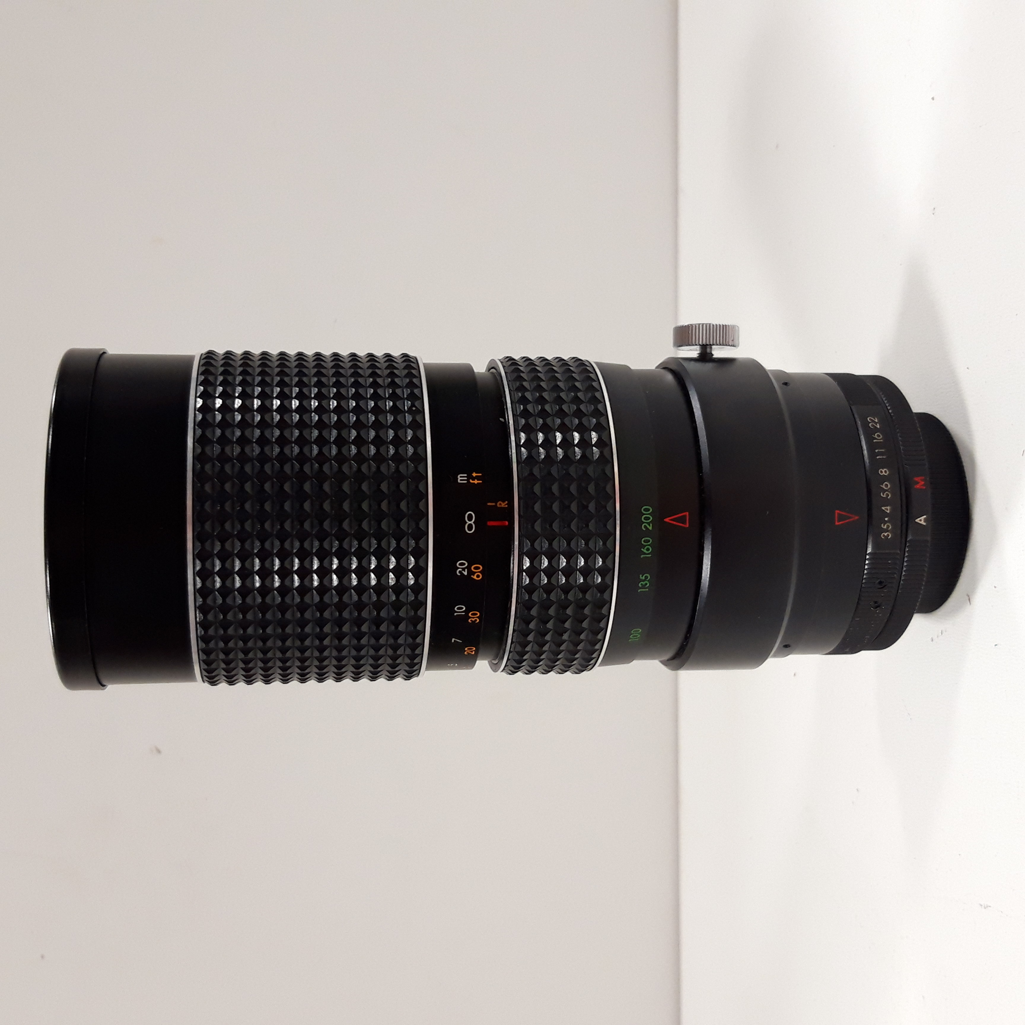 Voir photo 2 de Objectif Makinon auto zoom 1:3.5 f=80-200mm 62o No.750734 Objectif Makinon auto zoom 1:3.5 f=80-200mm 62o No.750734 Bon état reconditionné photo 2