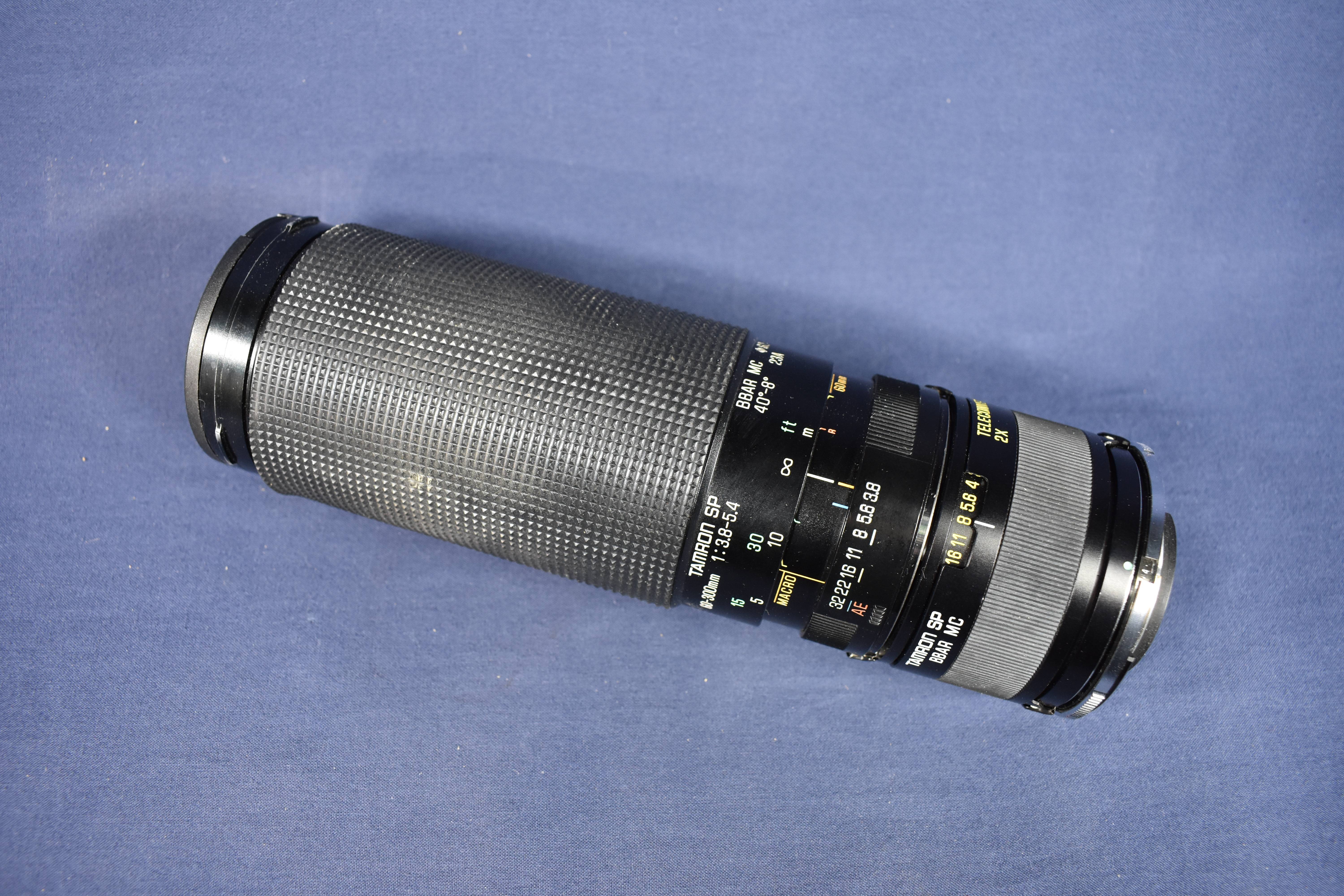 Voir photo 6 de Objectif TAMRON SP 60-300, 1: 3.8 - 5.4, longueur 22 diamètre 6.5 cm. Objectif TAMRON SP 60-300, 1: 3.8 - 5.4, longueur 22 diamètre 6.5 cm. Bon état reconditionné photo 6