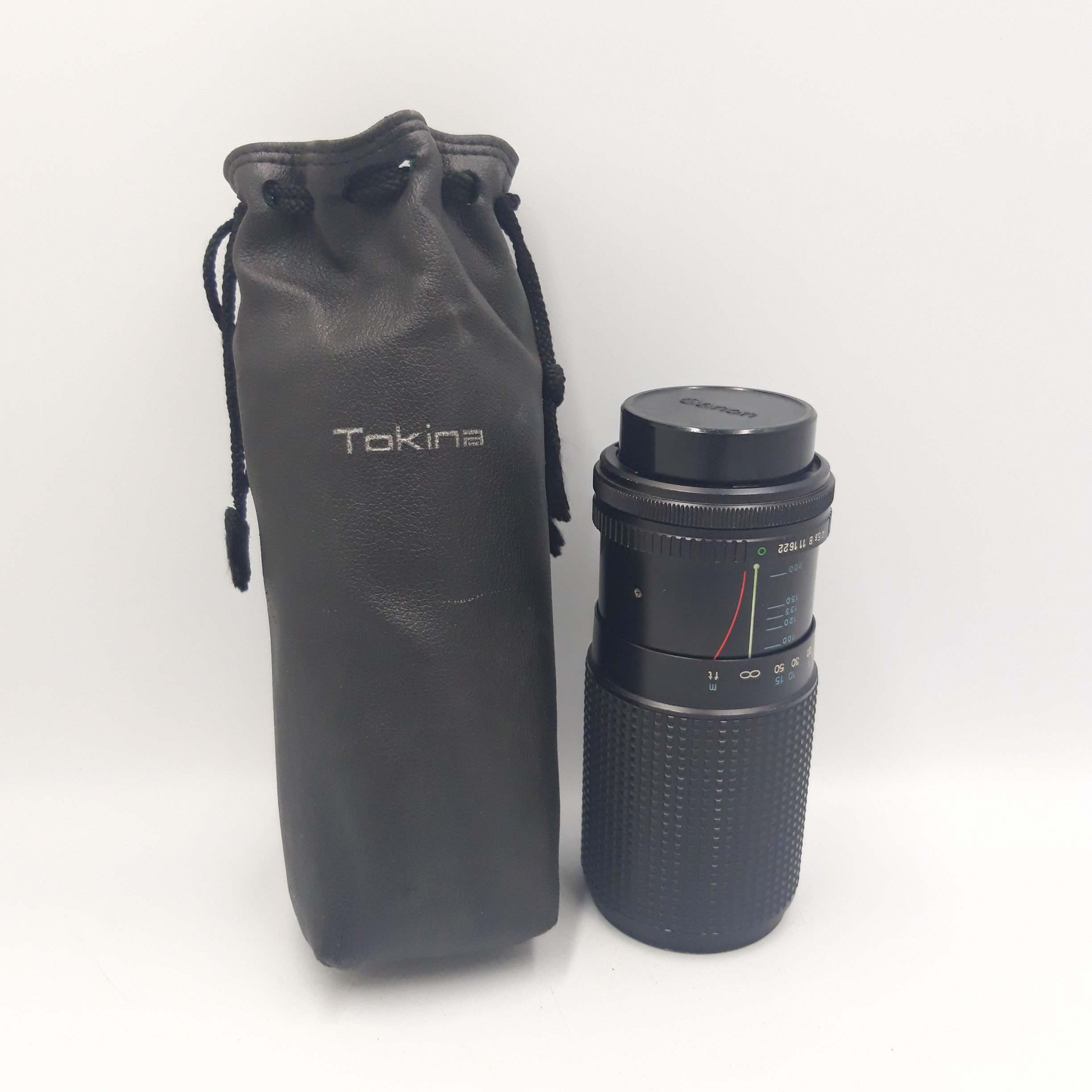 Voir photo 2 de Objectif zoom RMC tokina 80-200 mm 1:4 Objectif zoom RMC tokina 80-200 mm 1:4 Bon état reconditionné photo 2