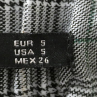 Voir photo 6 de Pantalon à carreaux gris et noirs - Femme - Zara - Taille S Pantalon à carreaux gris et noirs - Femme - Zara - Taille S Très bon état reconditionné photo 6