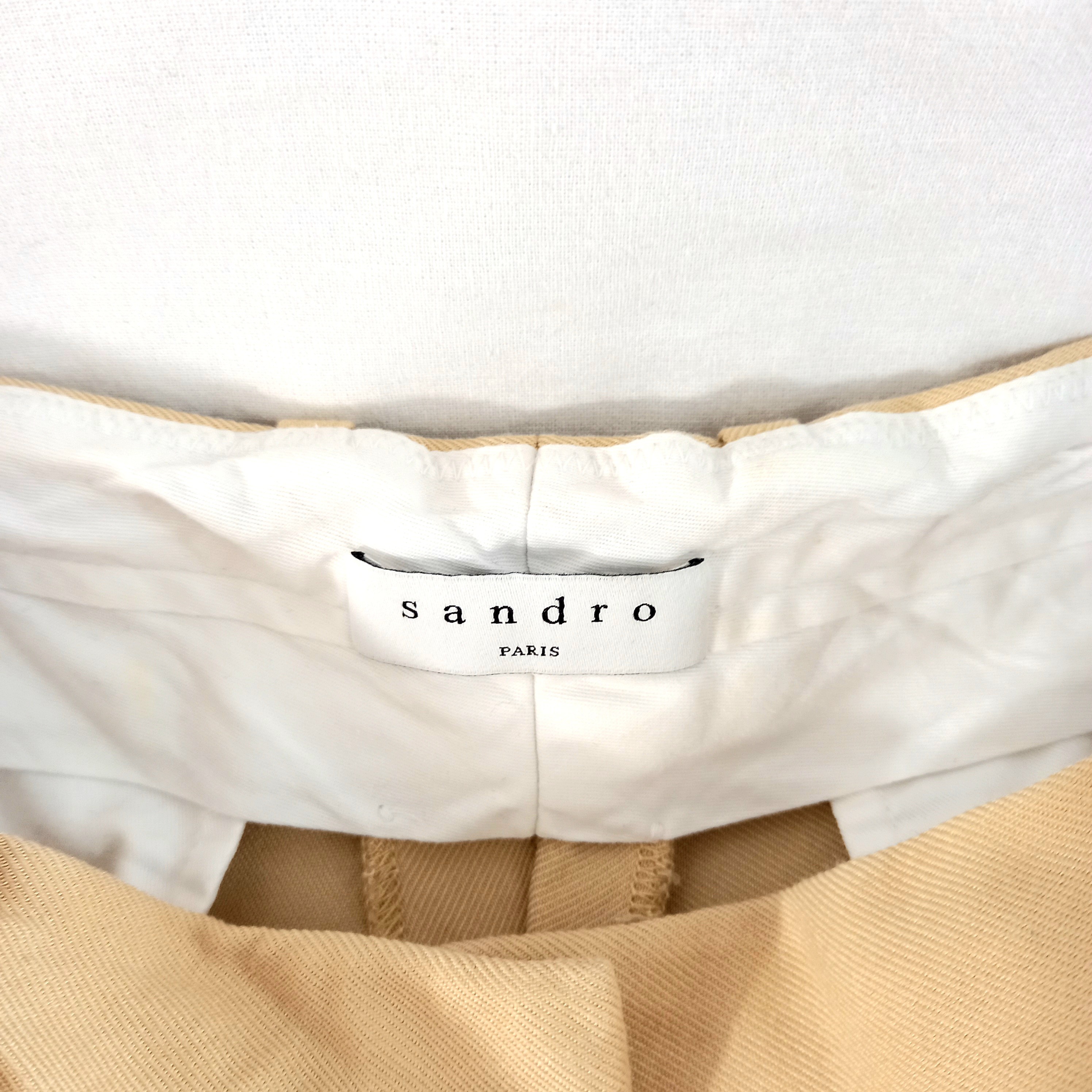 Voir photo 3 de Pantalon à pinces beige, de marque Sandro, en taille 36 Pantalon à pinces beige, de marque Sandro, en taille 36 Très bon état reconditionné photo 3