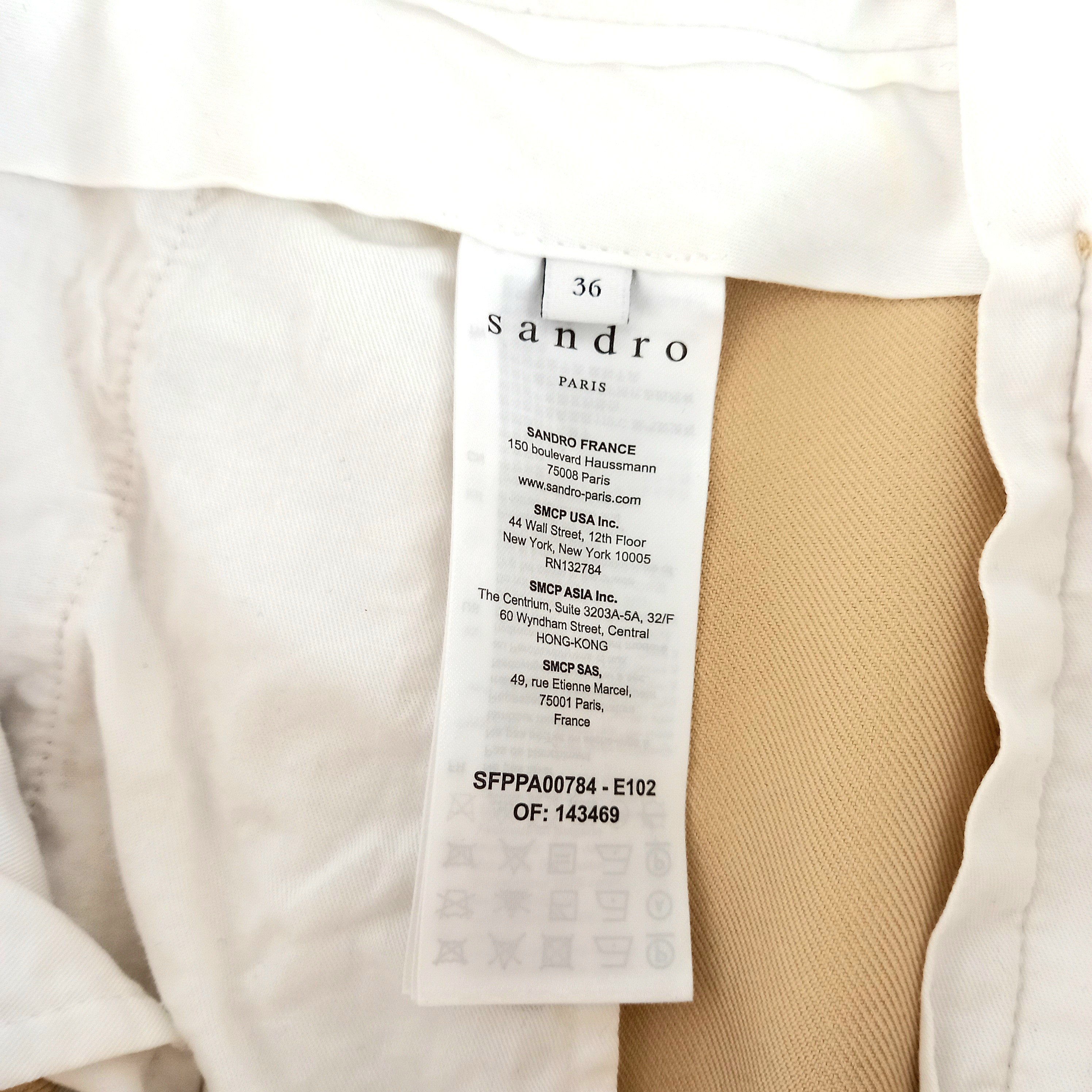 Voir photo 4 de Pantalon à pinces beige, de marque Sandro, en taille 36 Pantalon à pinces beige, de marque Sandro, en taille 36 Très bon état reconditionné photo 4