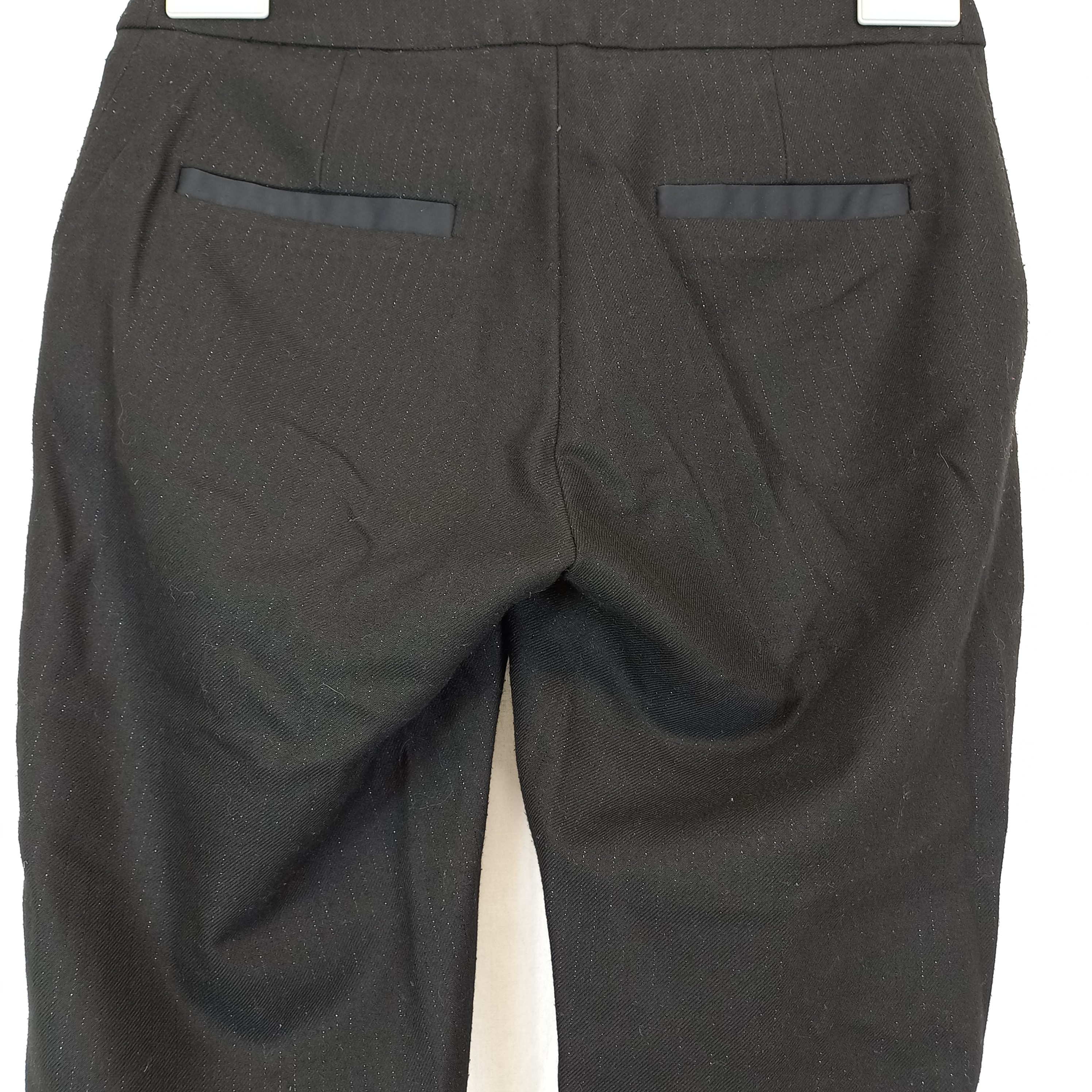 Voir photo 5 de Pantalon "kocca" noir fines rayures paillettéesrabat sur les 4 poches Pantalon "kocca" noir fines rayures paillettéesrabat sur les 4 poches Très bon état reconditionné photo 5